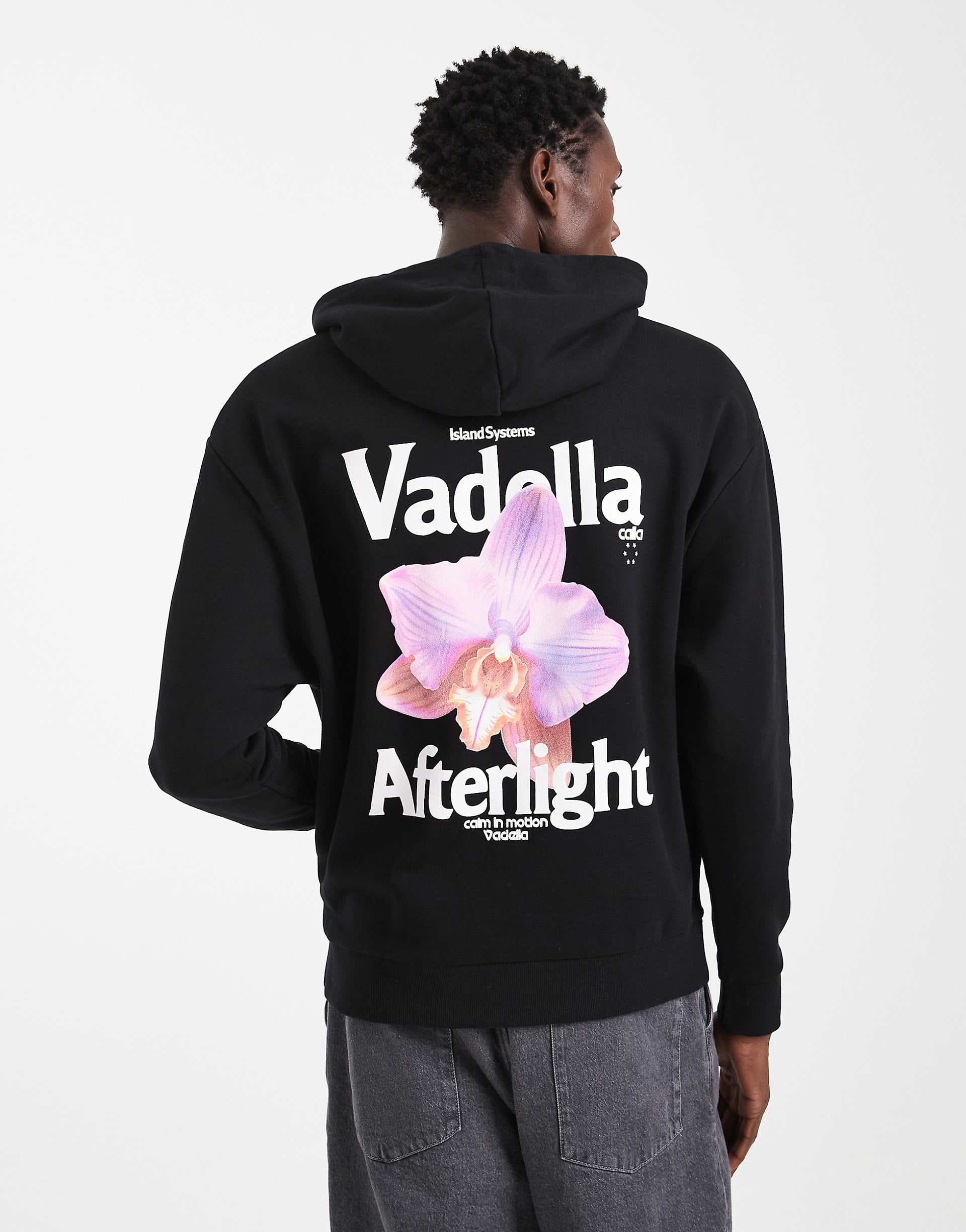 ASOS DESIGN relaxed hoodie with photographic floral print in black