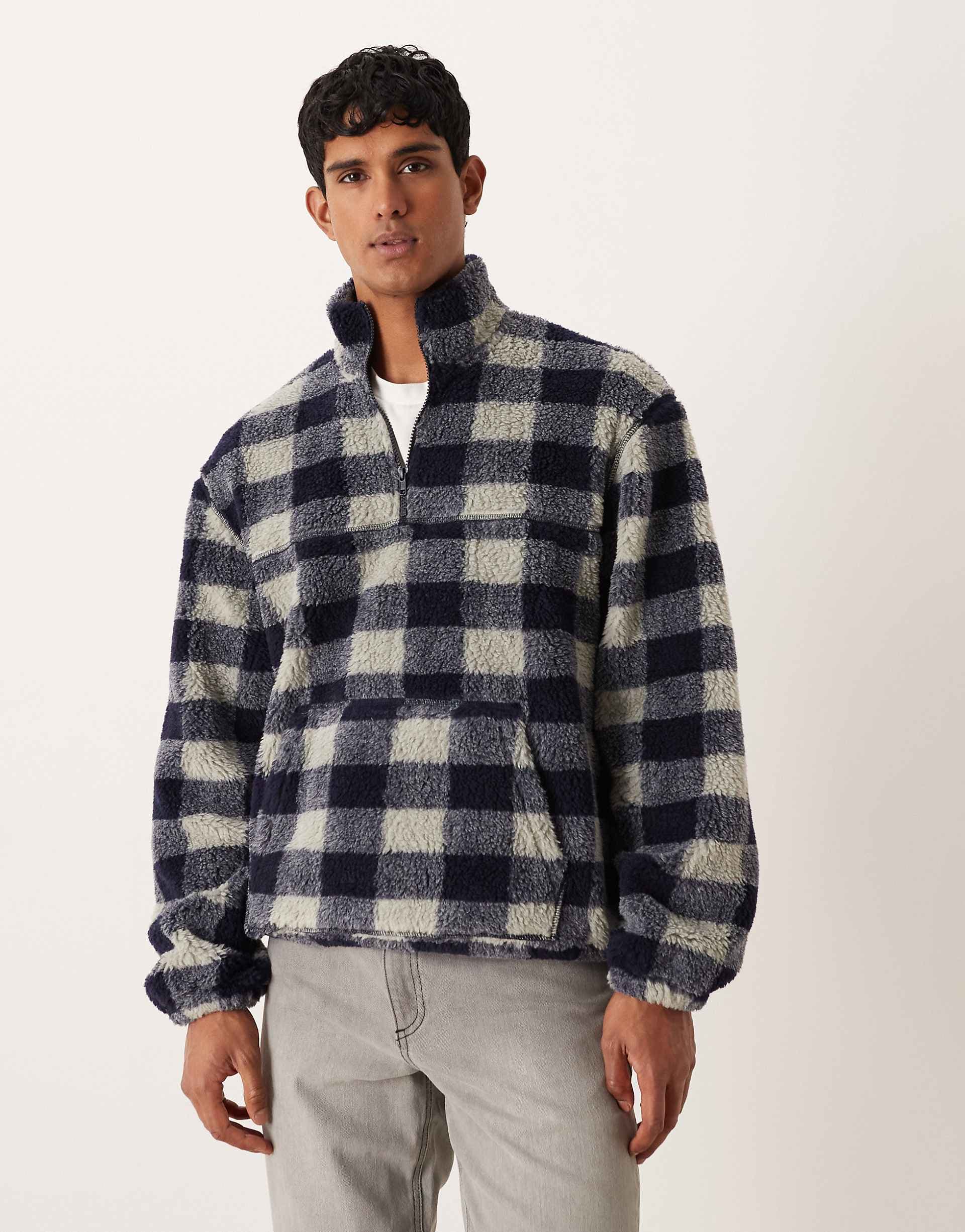 ASOS DESIGN relaxed quarter zip borg sweatshirt with plaid print in blue