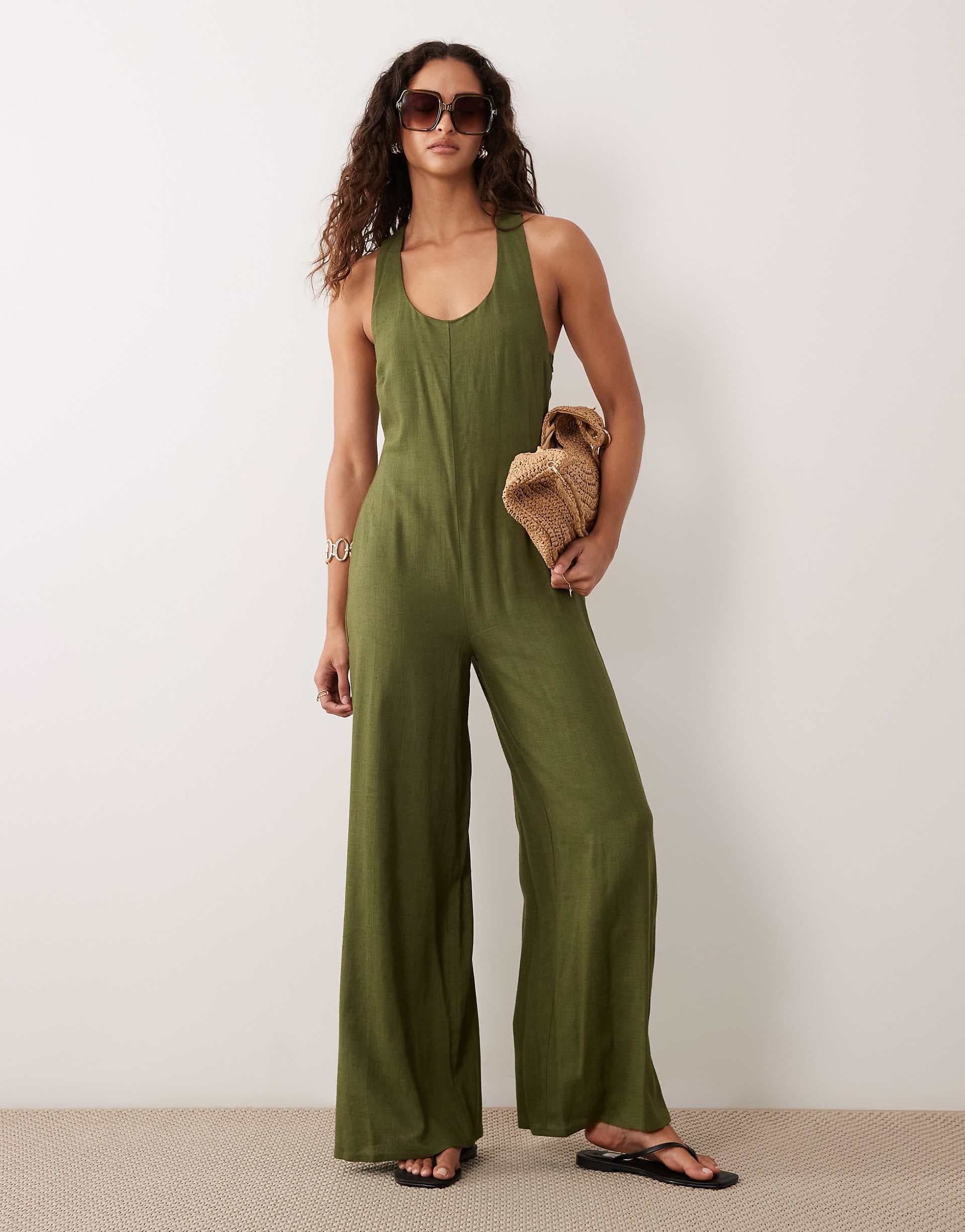 ASOS DESIGN wide leg jumpsuit with twist back in khaki green