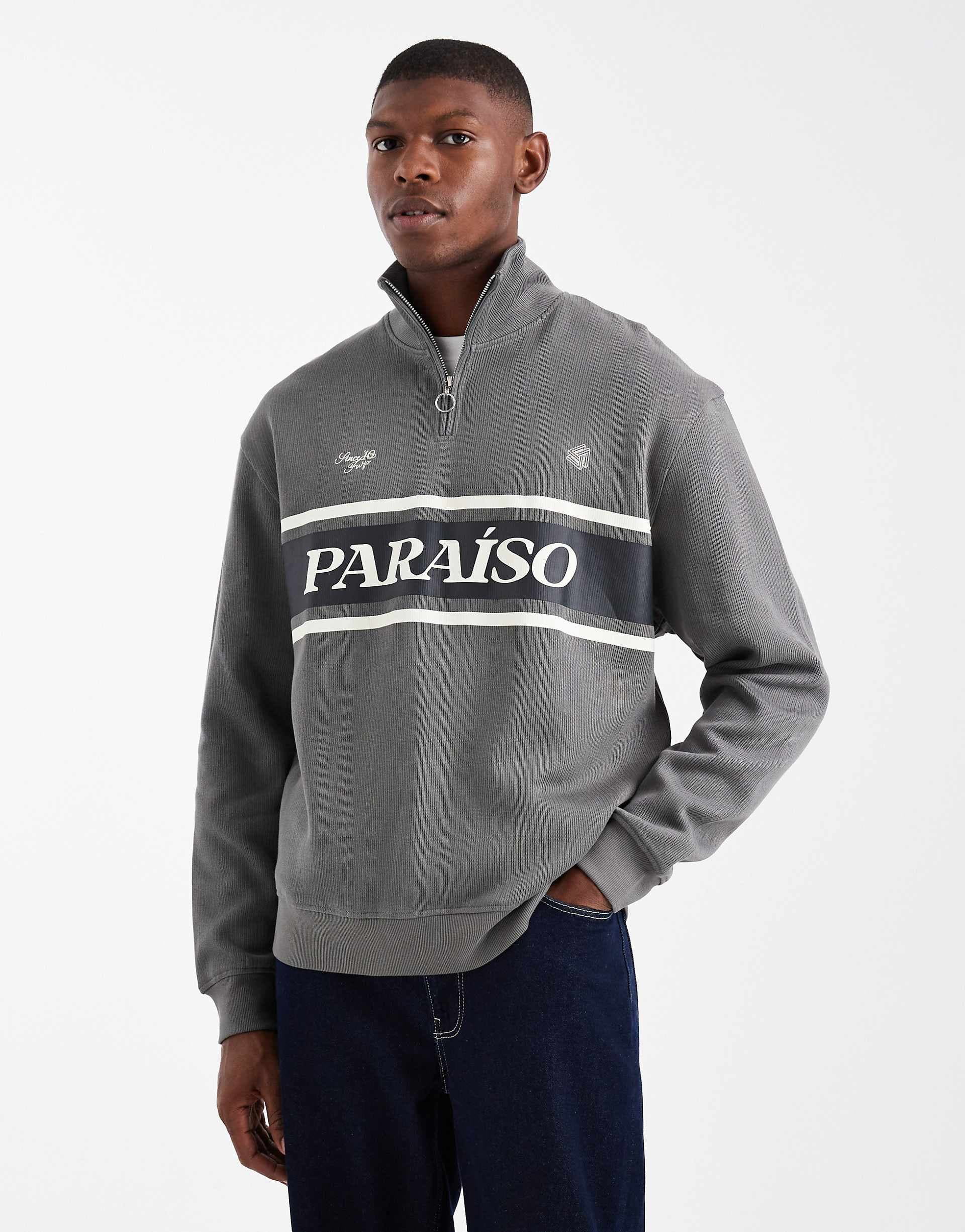 ASOS DESIGN relaxed fit quarter zip ribbed sweatshirt with sporty print
