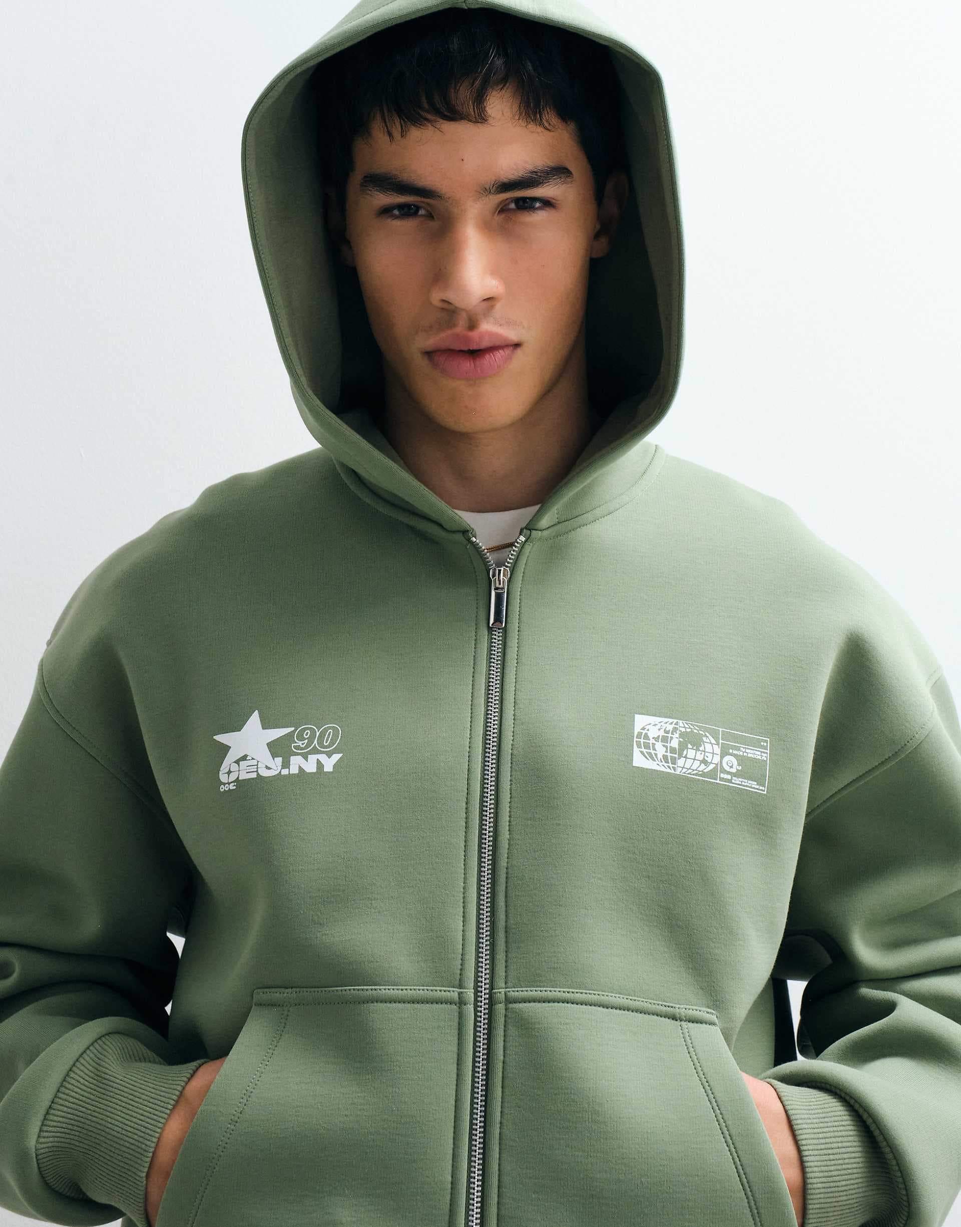 ASOS DESIGN relaxed boxy zip through hoodie in scuba-style fabric with print in green