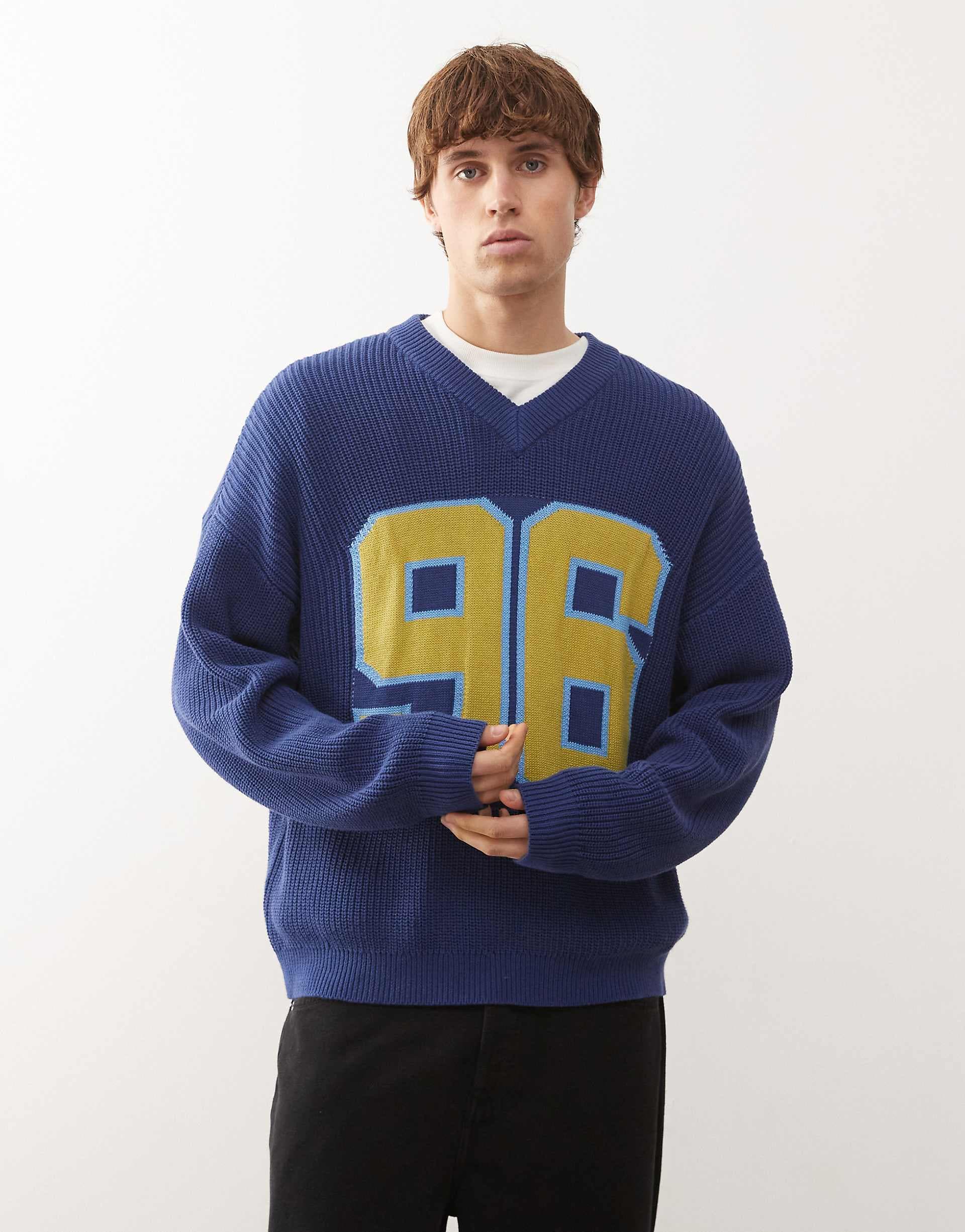 Reclaimed Vintage v-neck slouchy knit fisherman sweater in navy