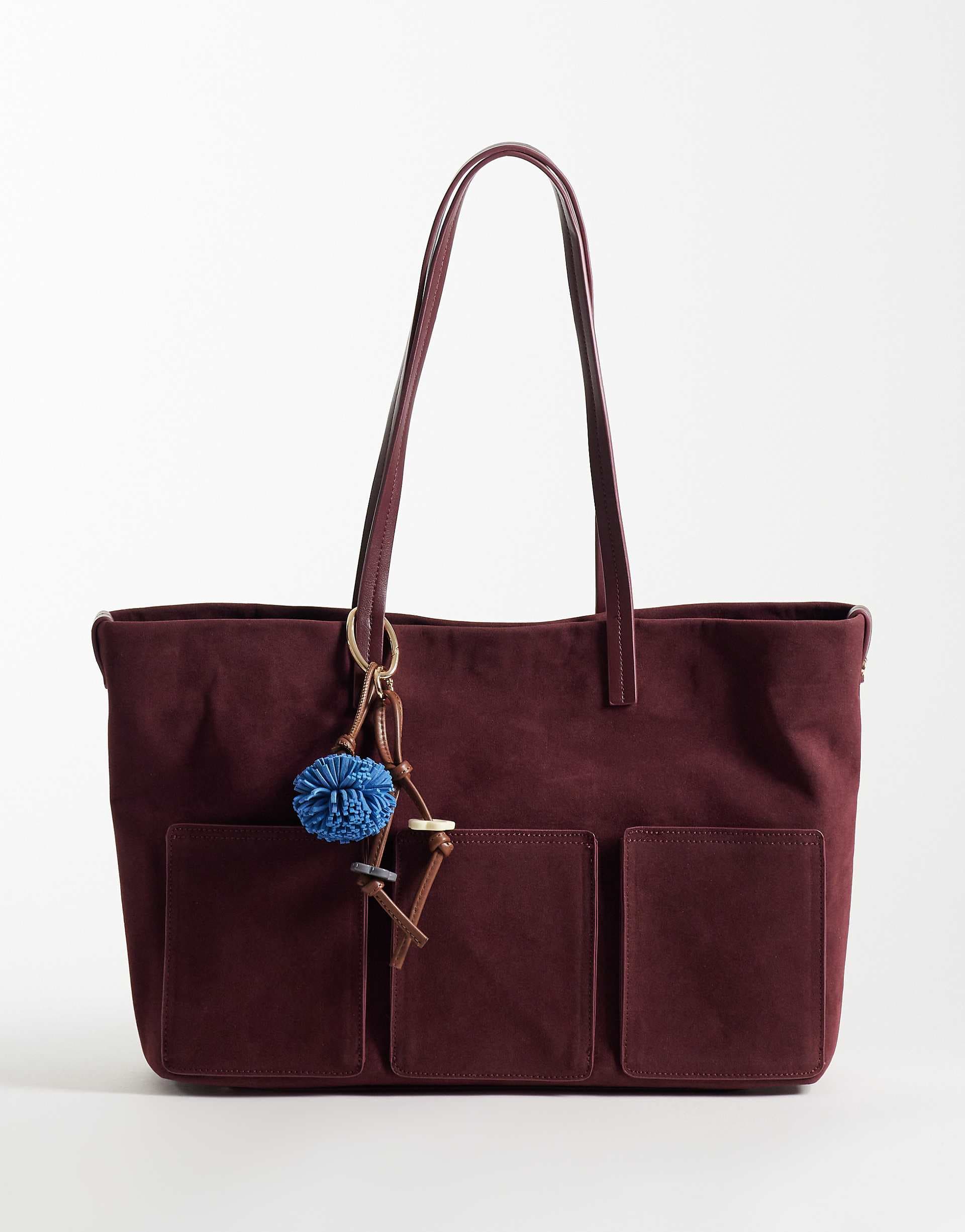 ASOS DESIGN faux suede pocket tote with bag charm in burgundy