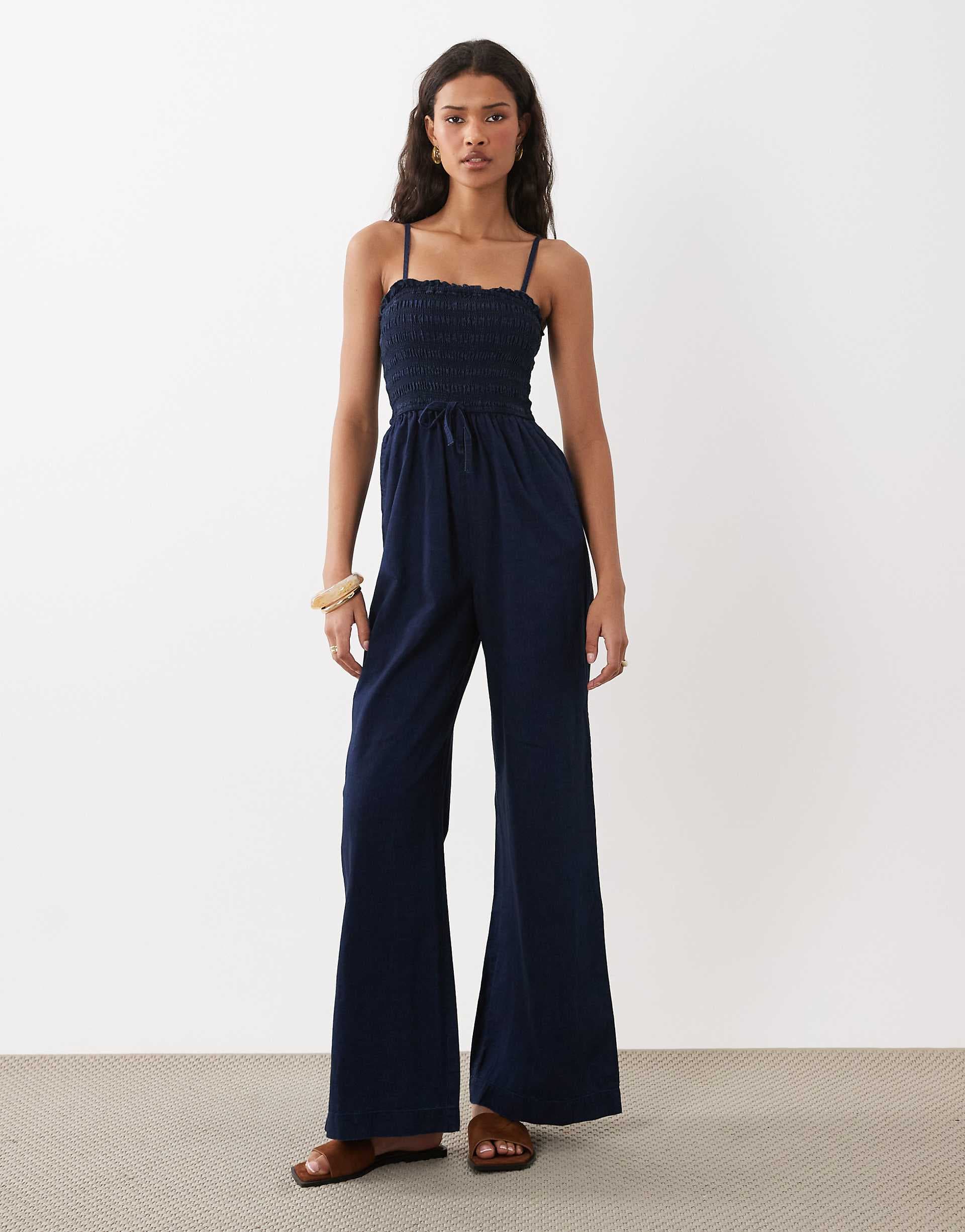 ASOS DESIGN shirred denim jumpsuit in inky wash