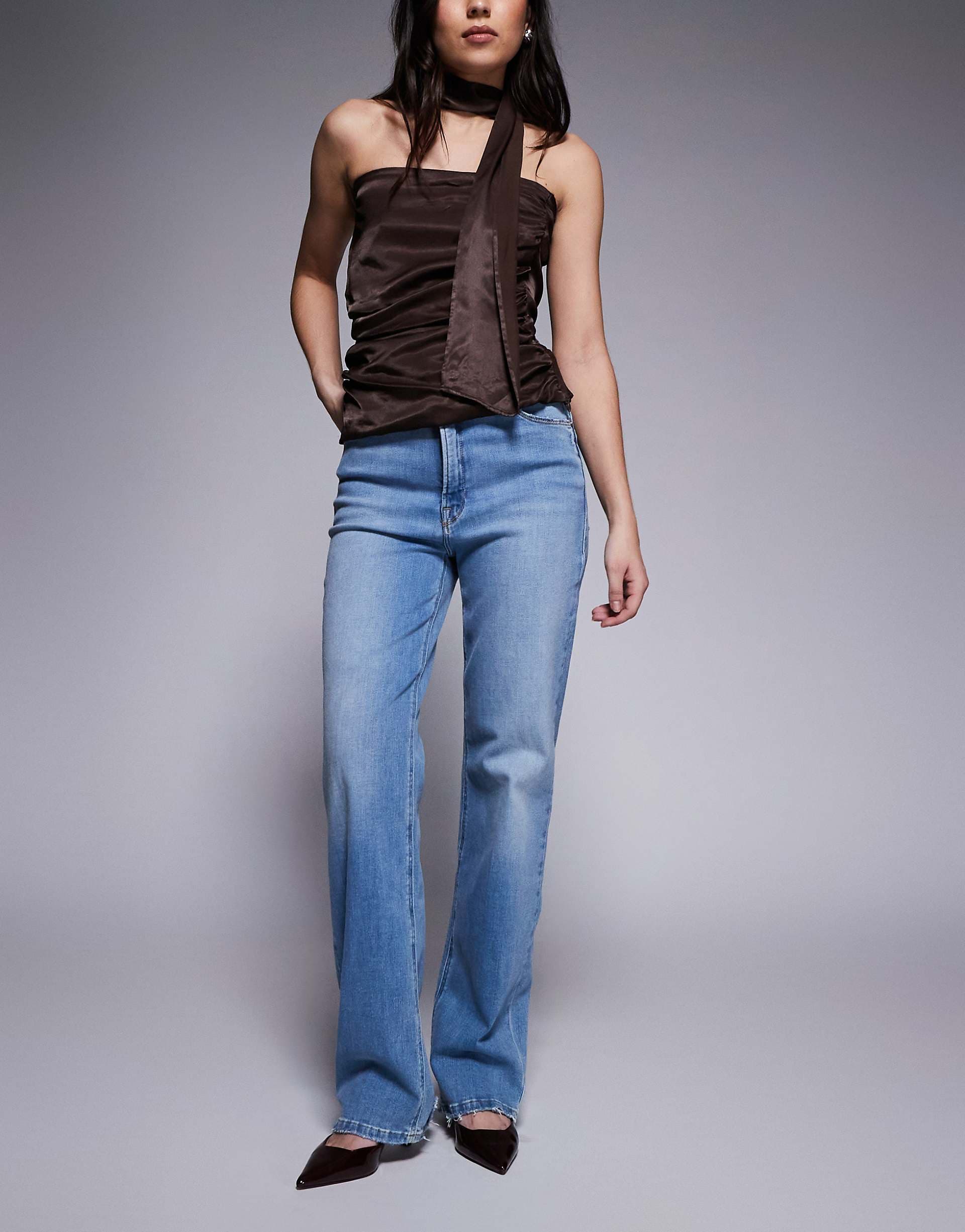 Good American Good True high waisted straight leg frayed hem super stretch denim jeans in light blue wash