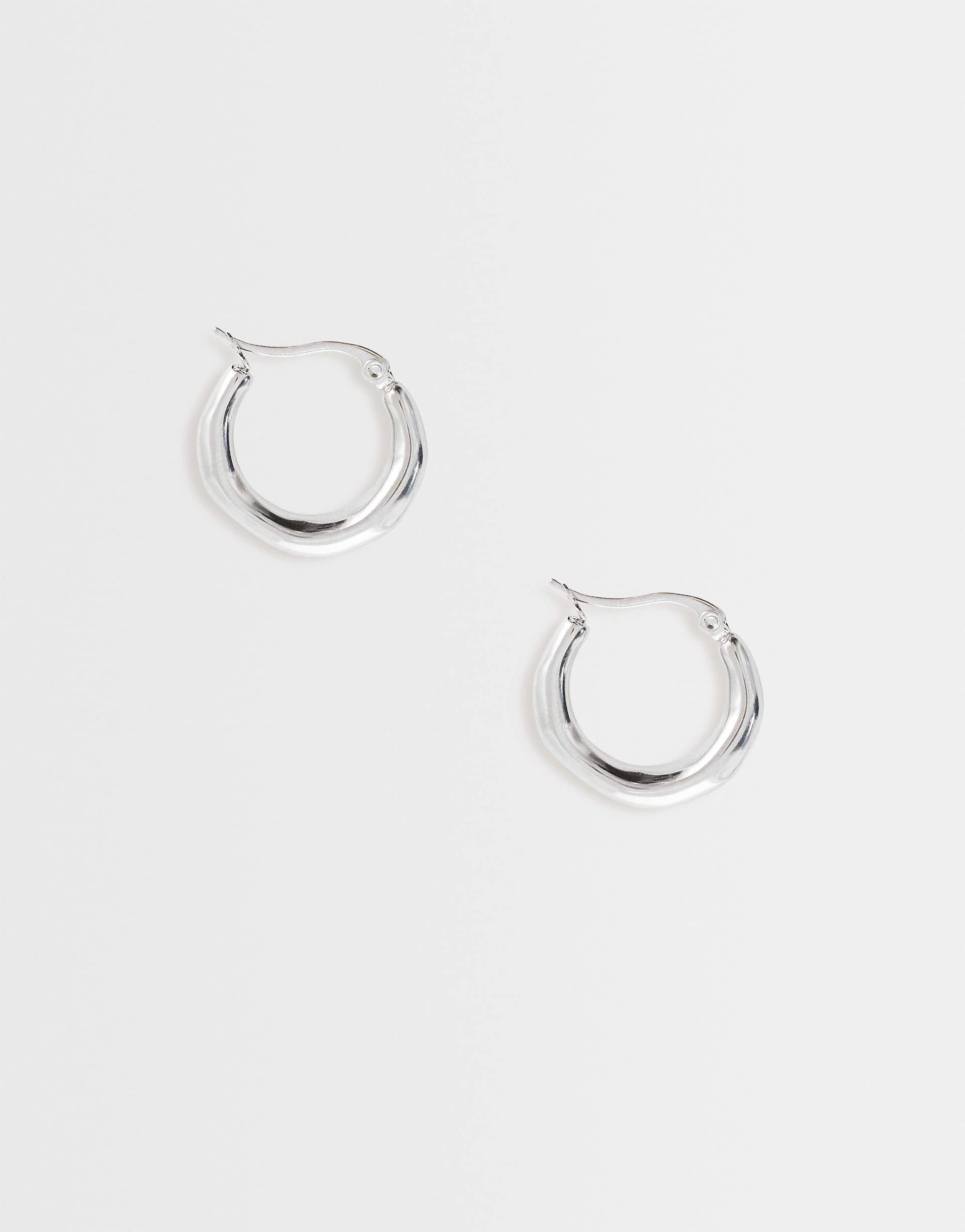 Lost Souls molten hoop earrings in stainless steel