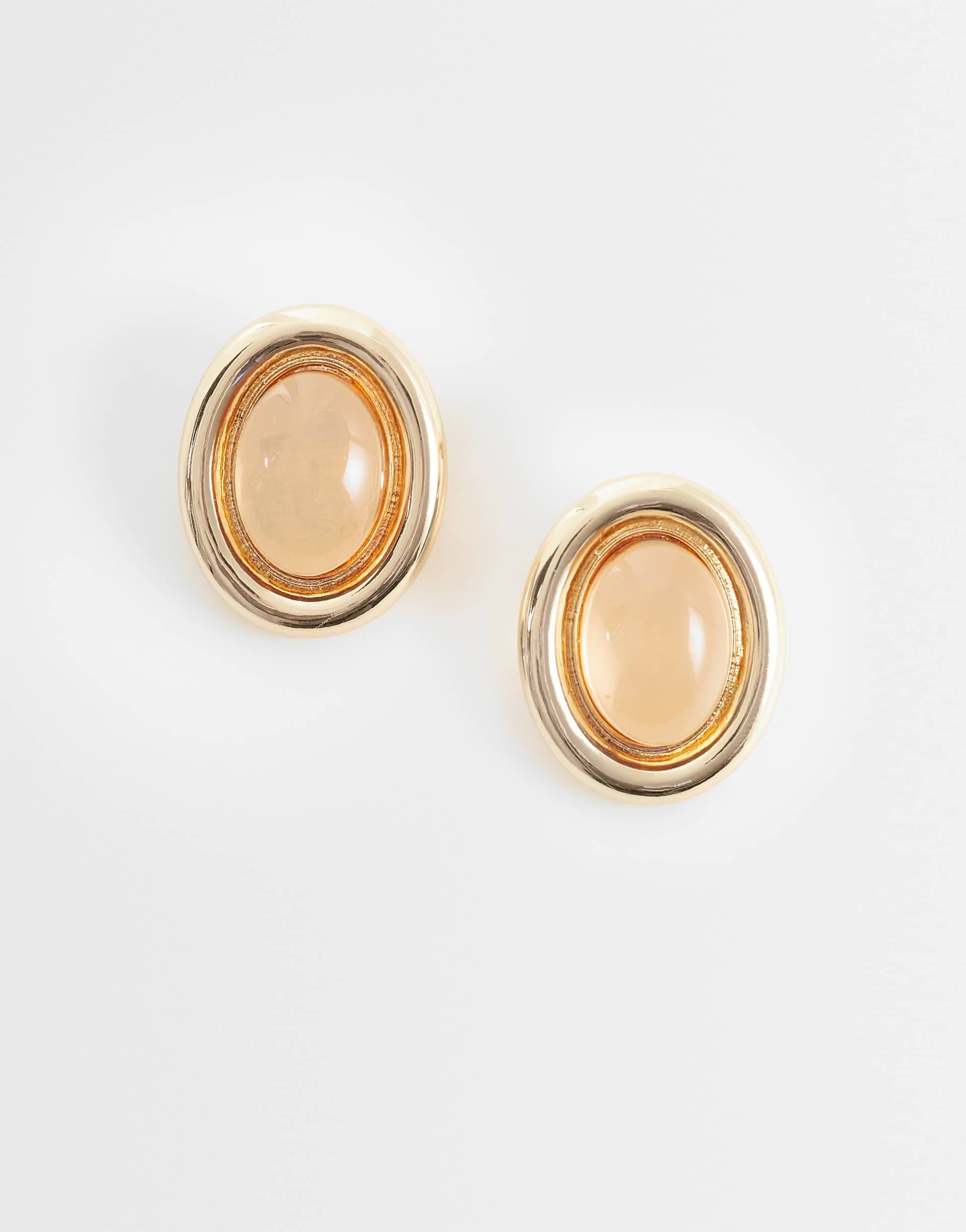 ASOS DESIGN stud earrings with stone set design in amber