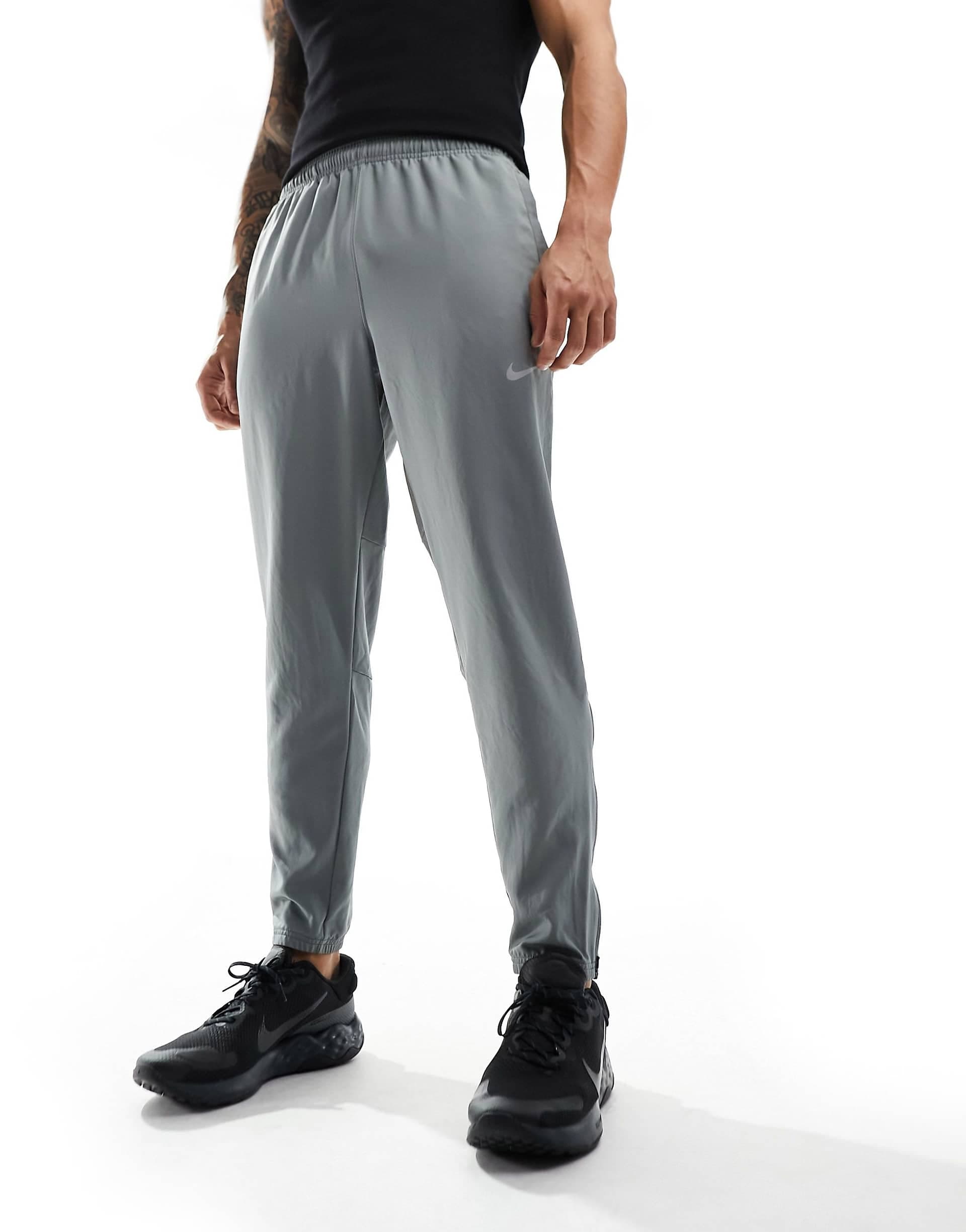 Nike Running Challenger woven sweatpants in gray
