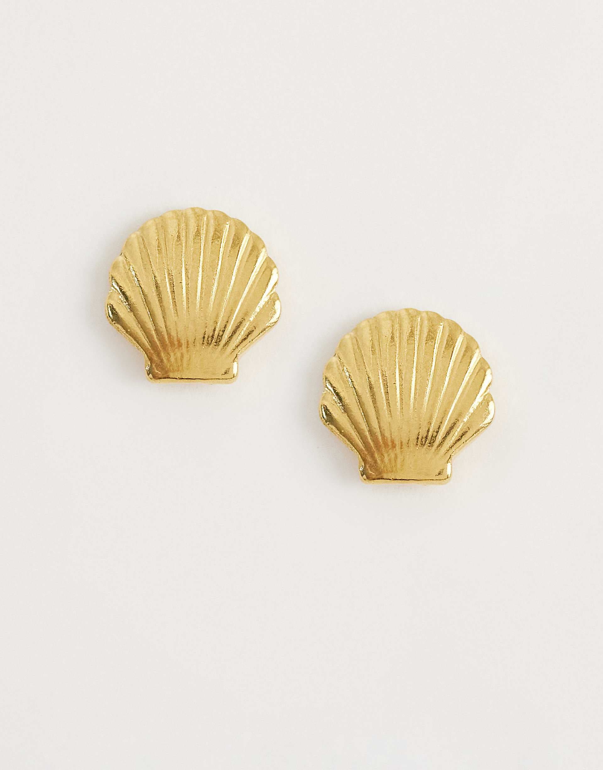 Lost Souls shell stud earrings in 18kt gold plated stainless steel