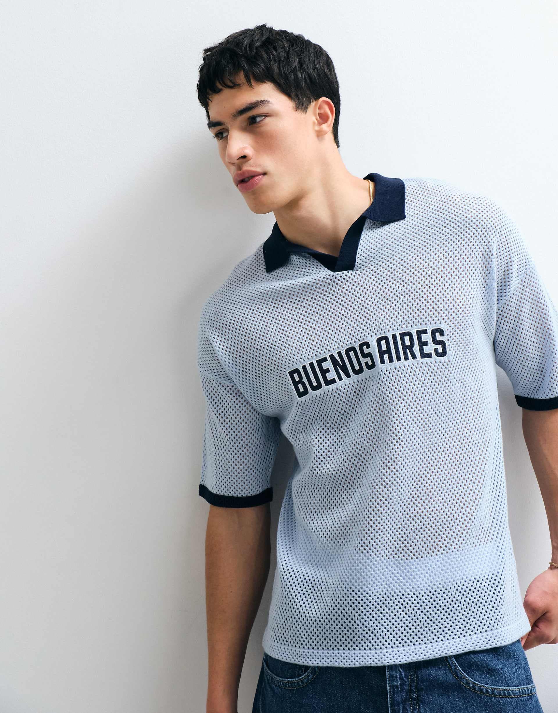 ASOS DESIGN oversized knit soccer style notch neck polo shirt with embroidery detailing in blue