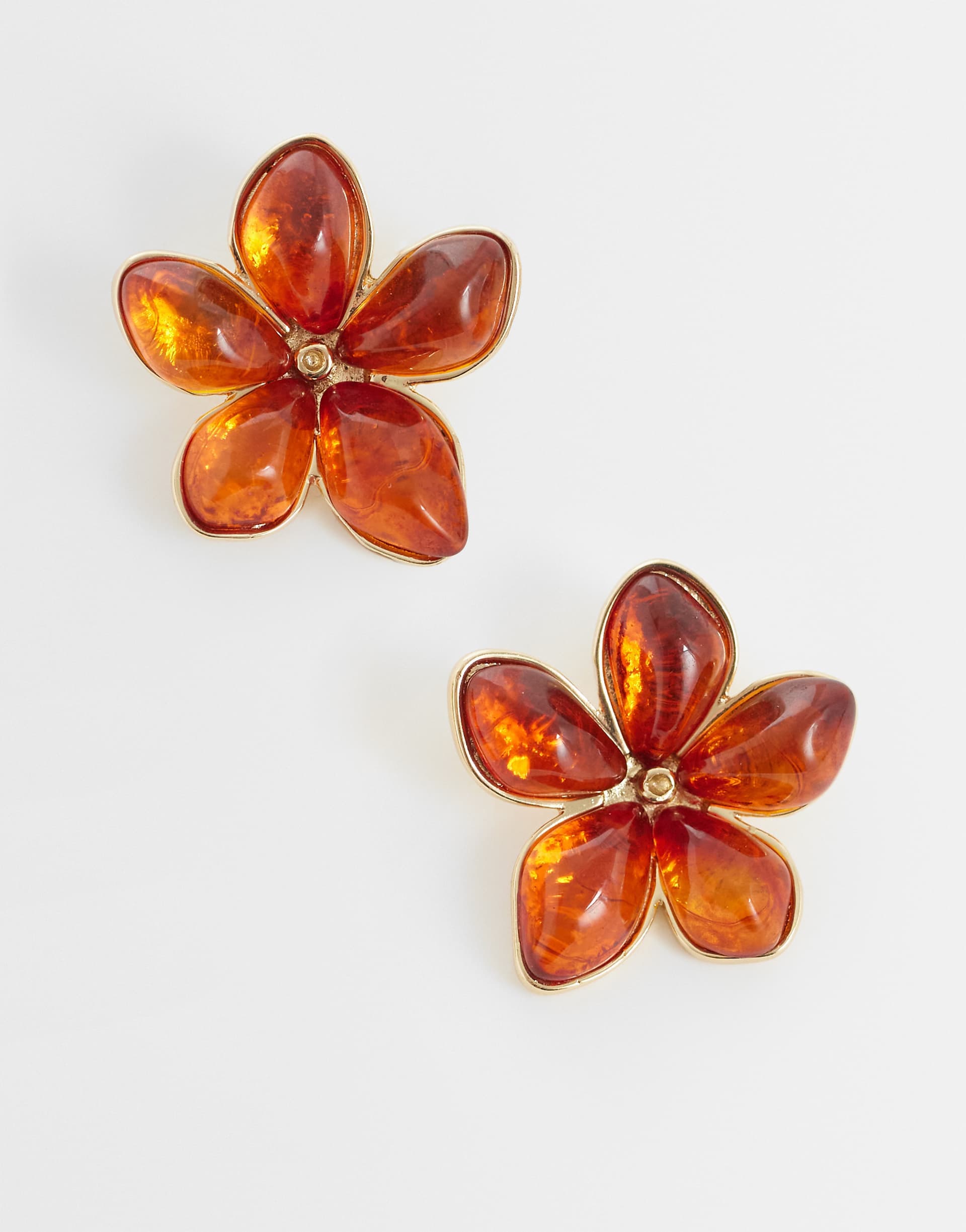 ASOS DESIGN stud earrings with flower design in amber resin
