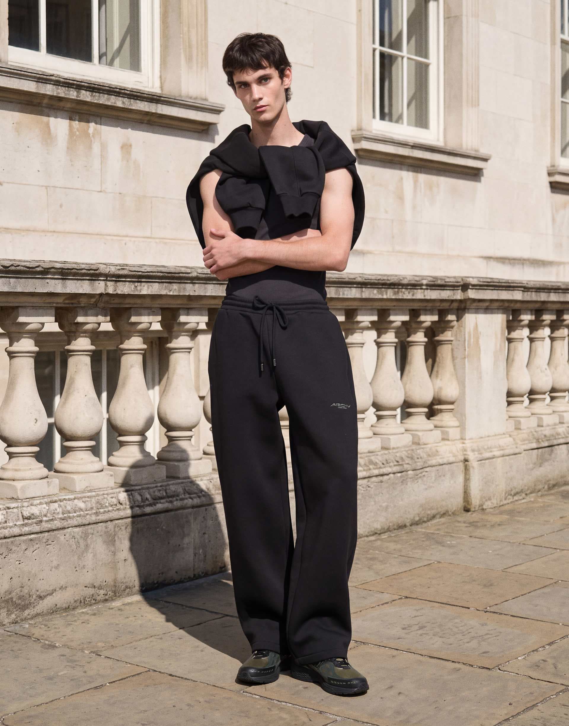 ASOS DESIGN wide leg sweatpants with embroidery in black scuba-style fabric