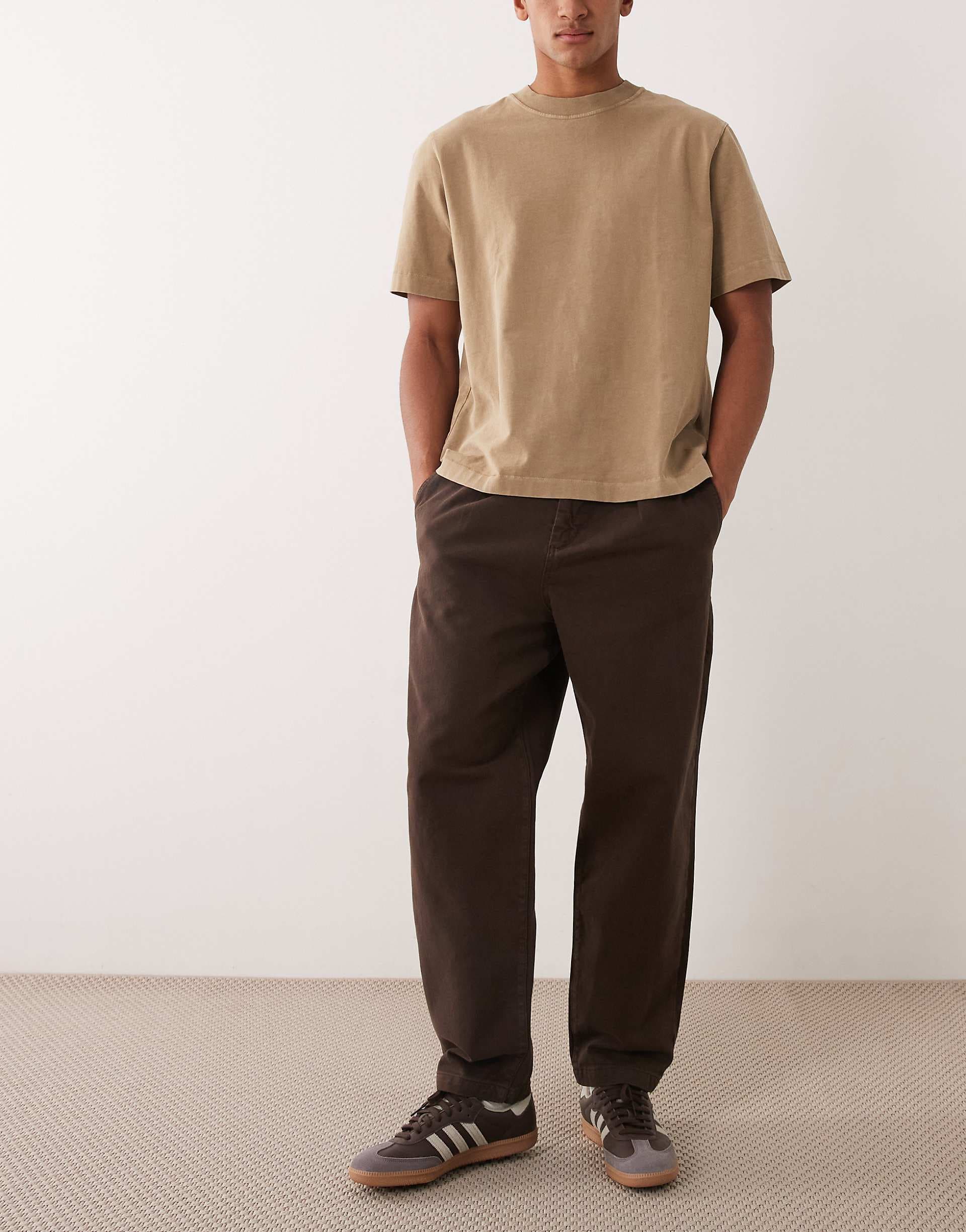 ASOS DESIGN relaxed tapered pants in brown with inverted pleats