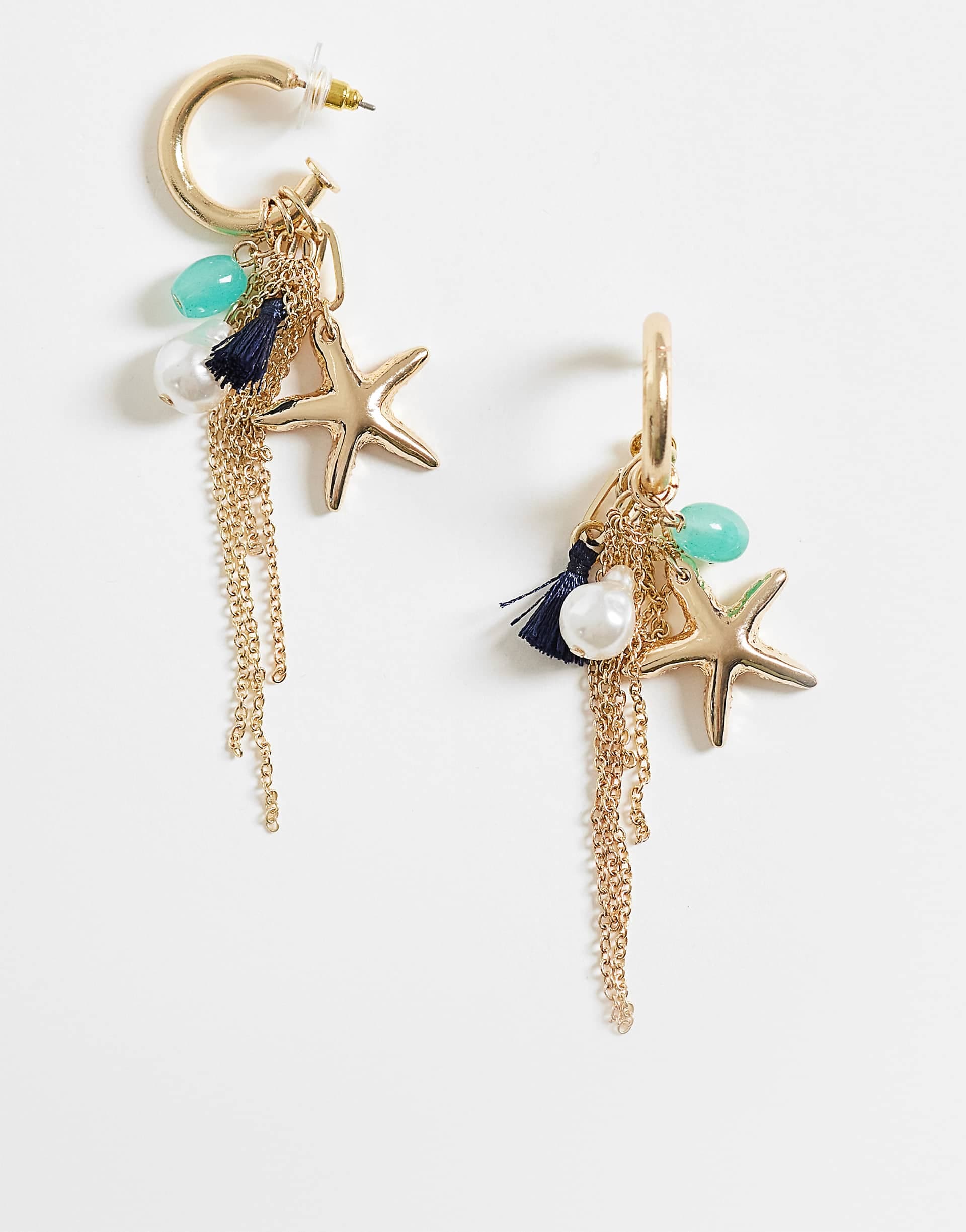ASOS DESIGN small hoop earrings with tassels and sea-life charms in gold tone