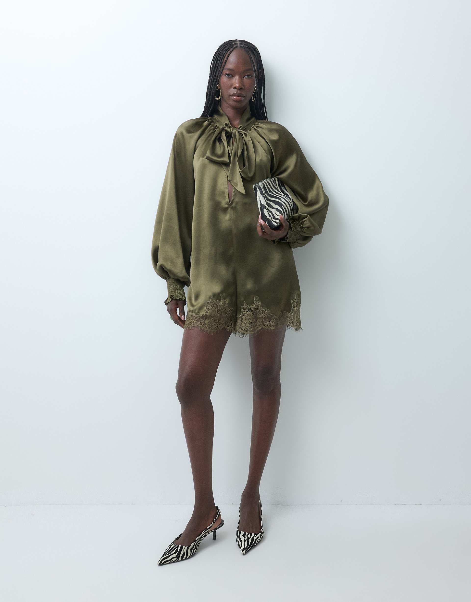 ASOS DESIGN tie neck satin romper with lace hem detail in olive