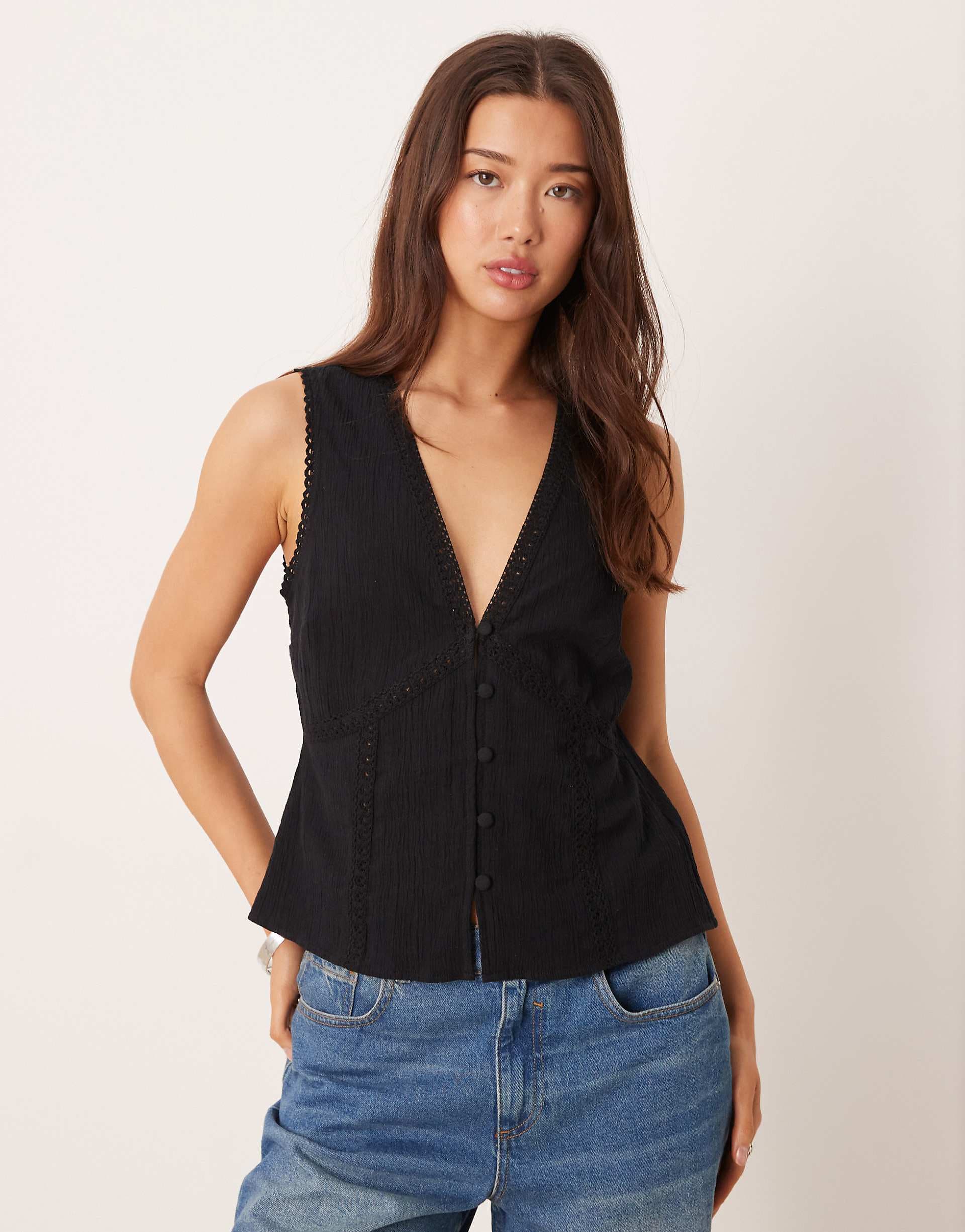 ASOS DESIGN lace trim vest in black
