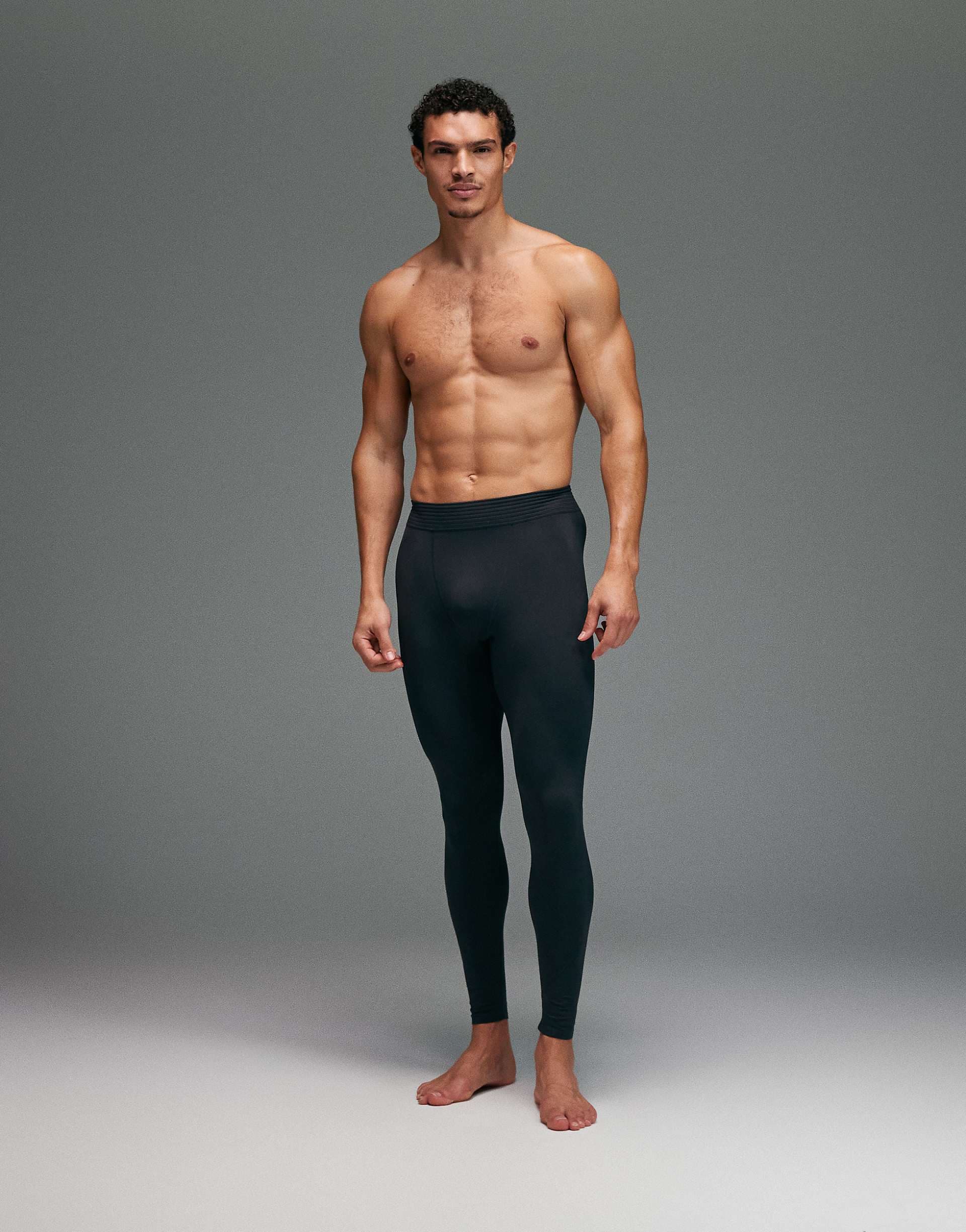 4505 seamless physique defining compression base layer tights in black