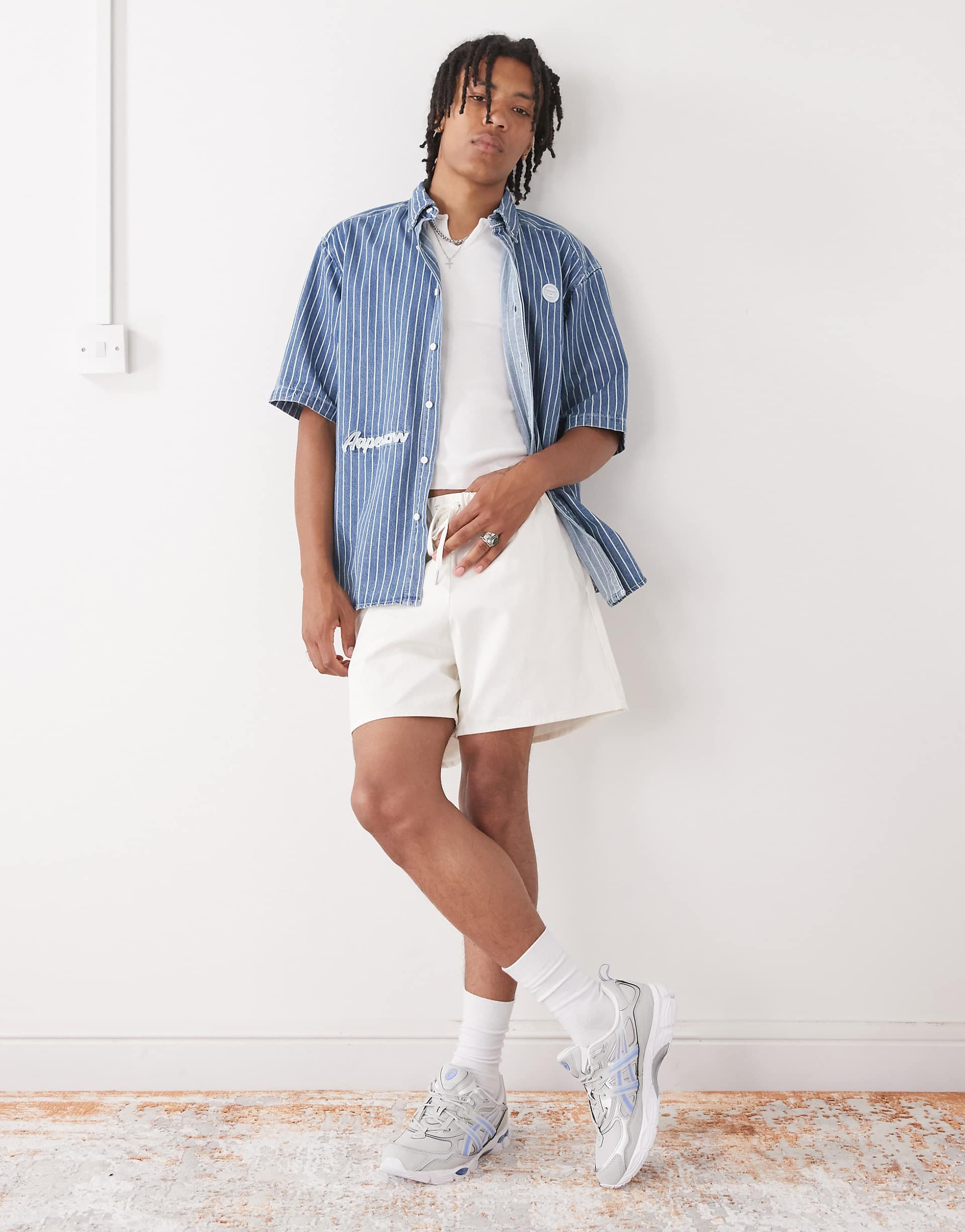 Reclaimed Vintage baggy fit shorter length pull on chino shorts in ecru