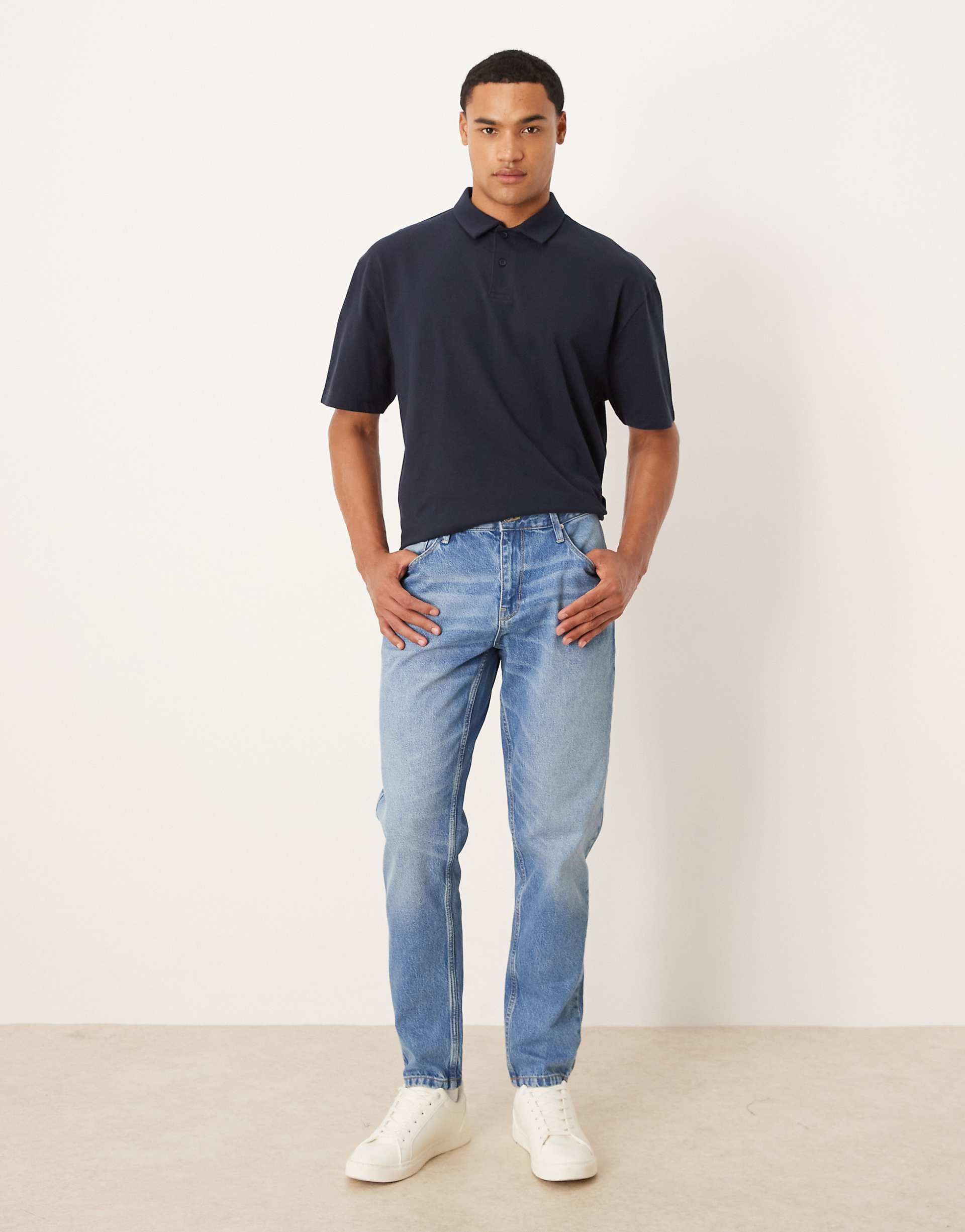 ASOS DESIGN tapered jeans in light wash
