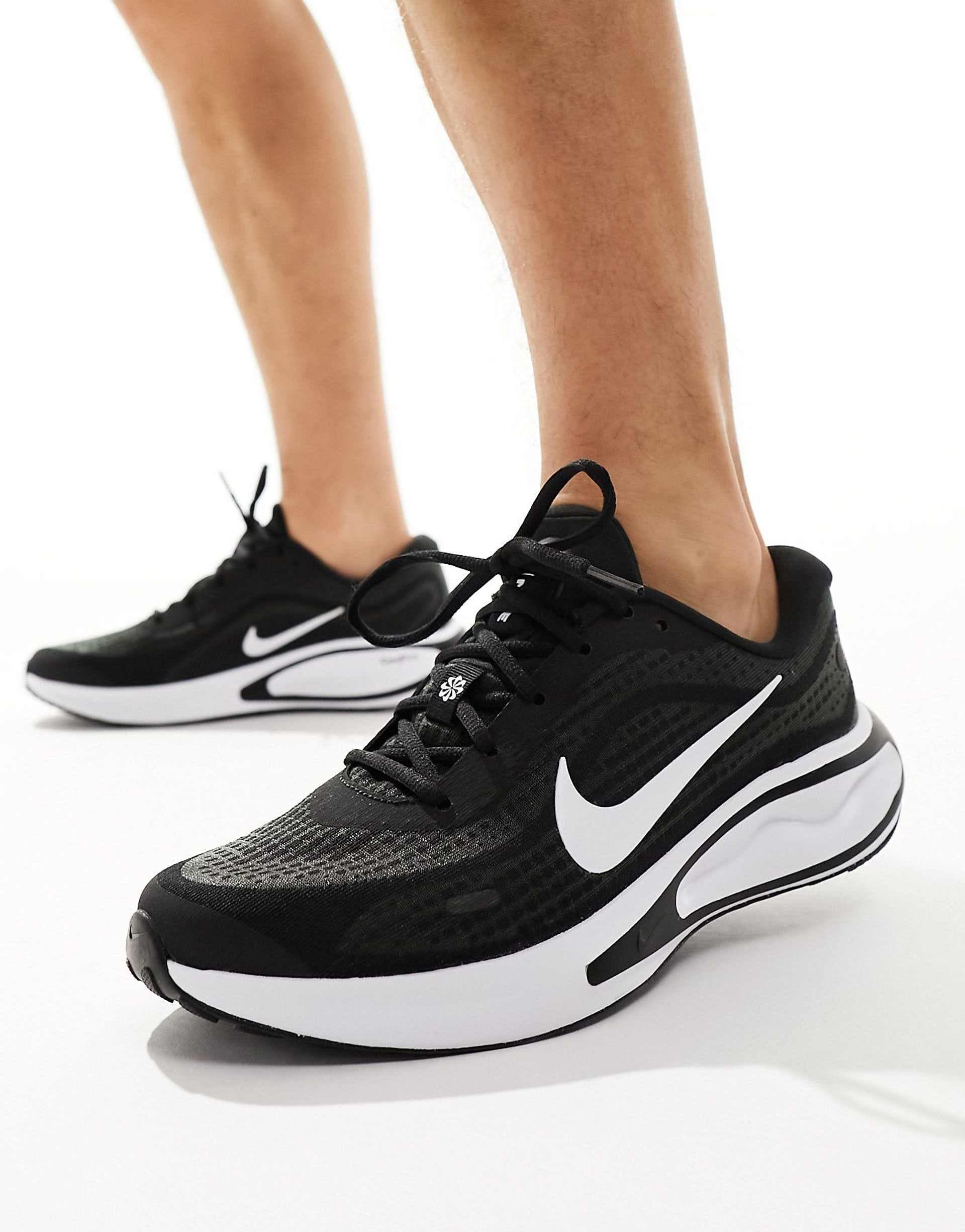 Nike Running Journey Run sneakers in black and white