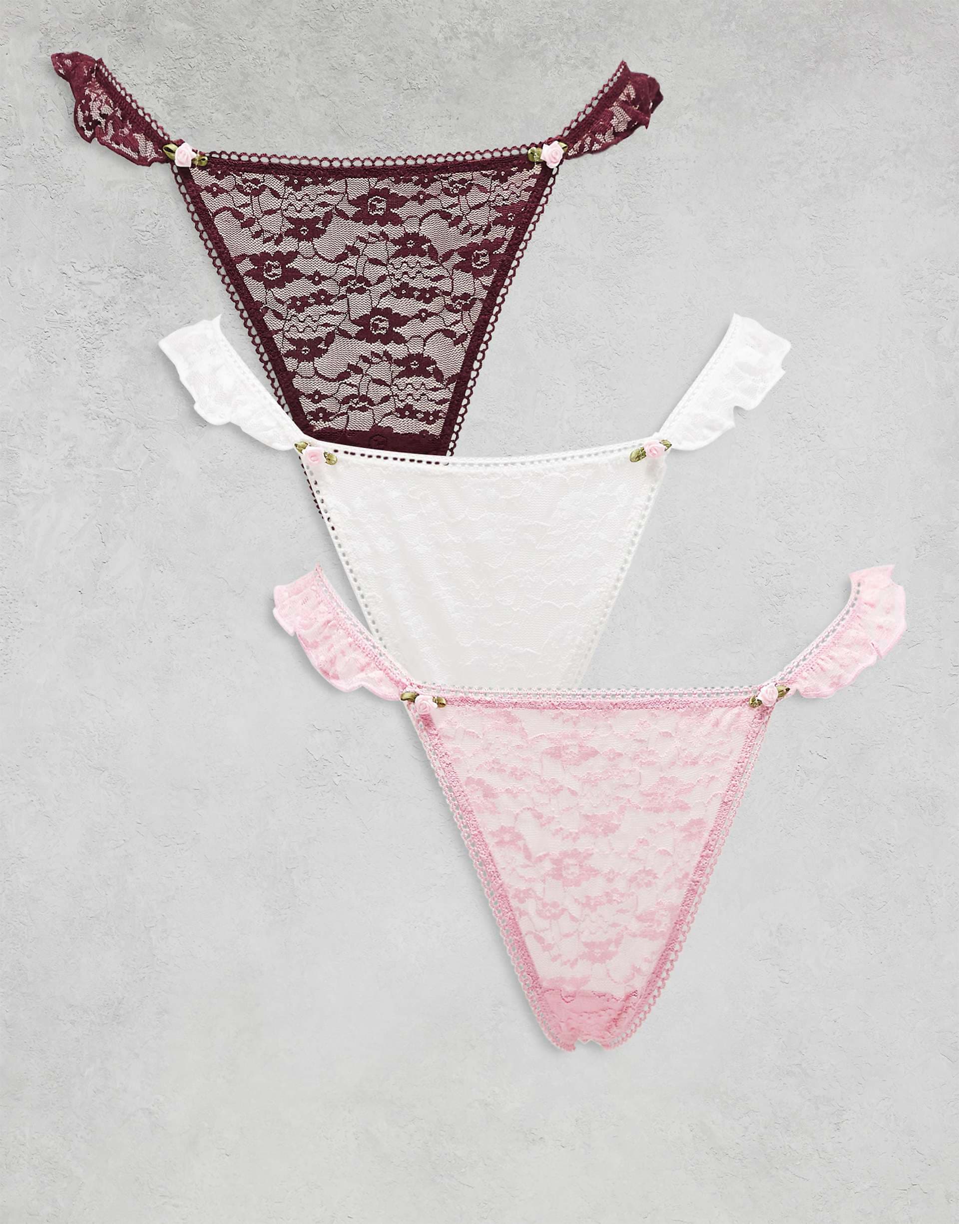 ASOS DESIGN 3-pack lace tanga thongs with lace ruffle side and rosebud trim in pink, white & chocolate