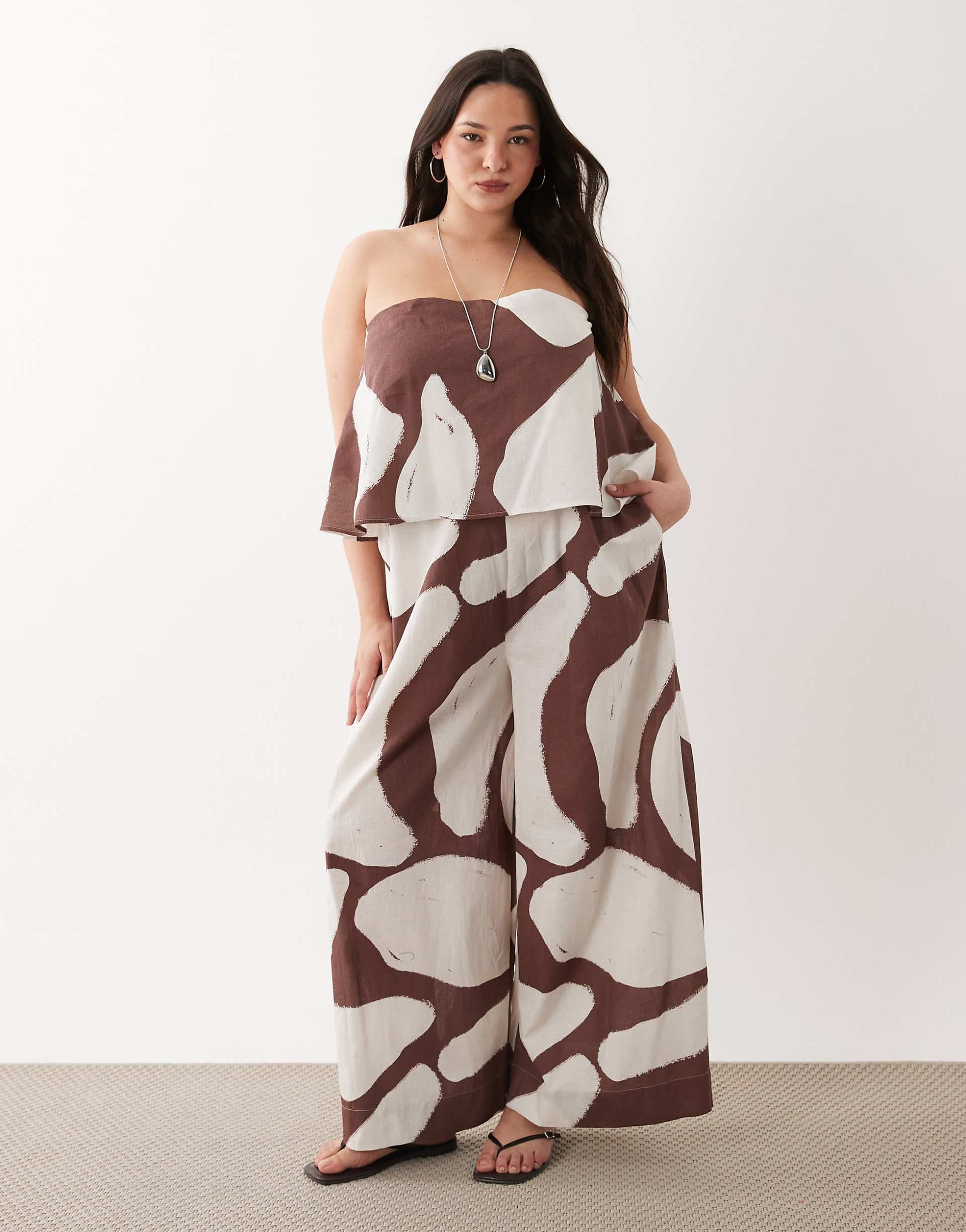 ASOS DESIGN Curve strapless double layer jumpsuit in brown print