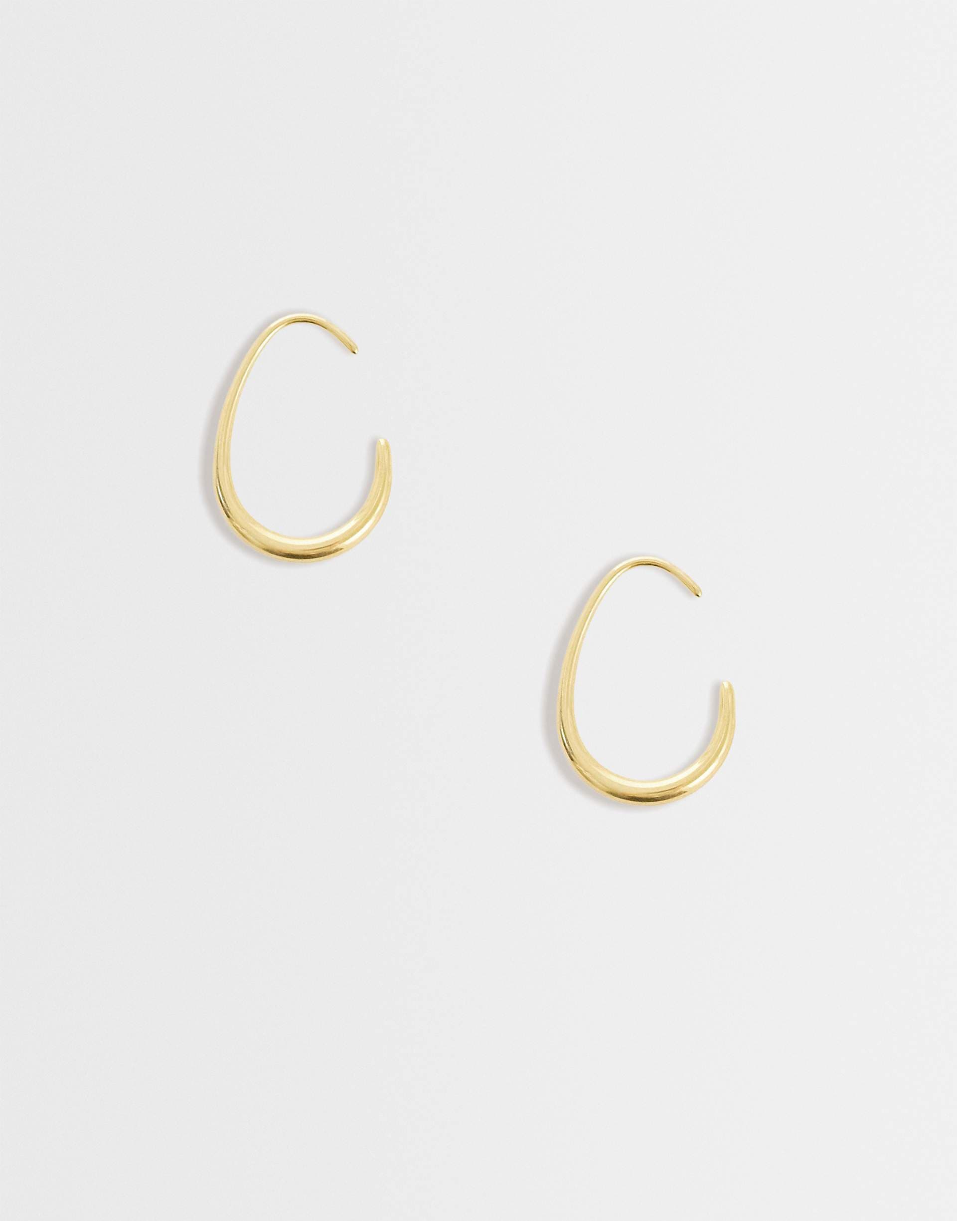Lost Souls slim oval open hoops in 18k gold plated stainless steel