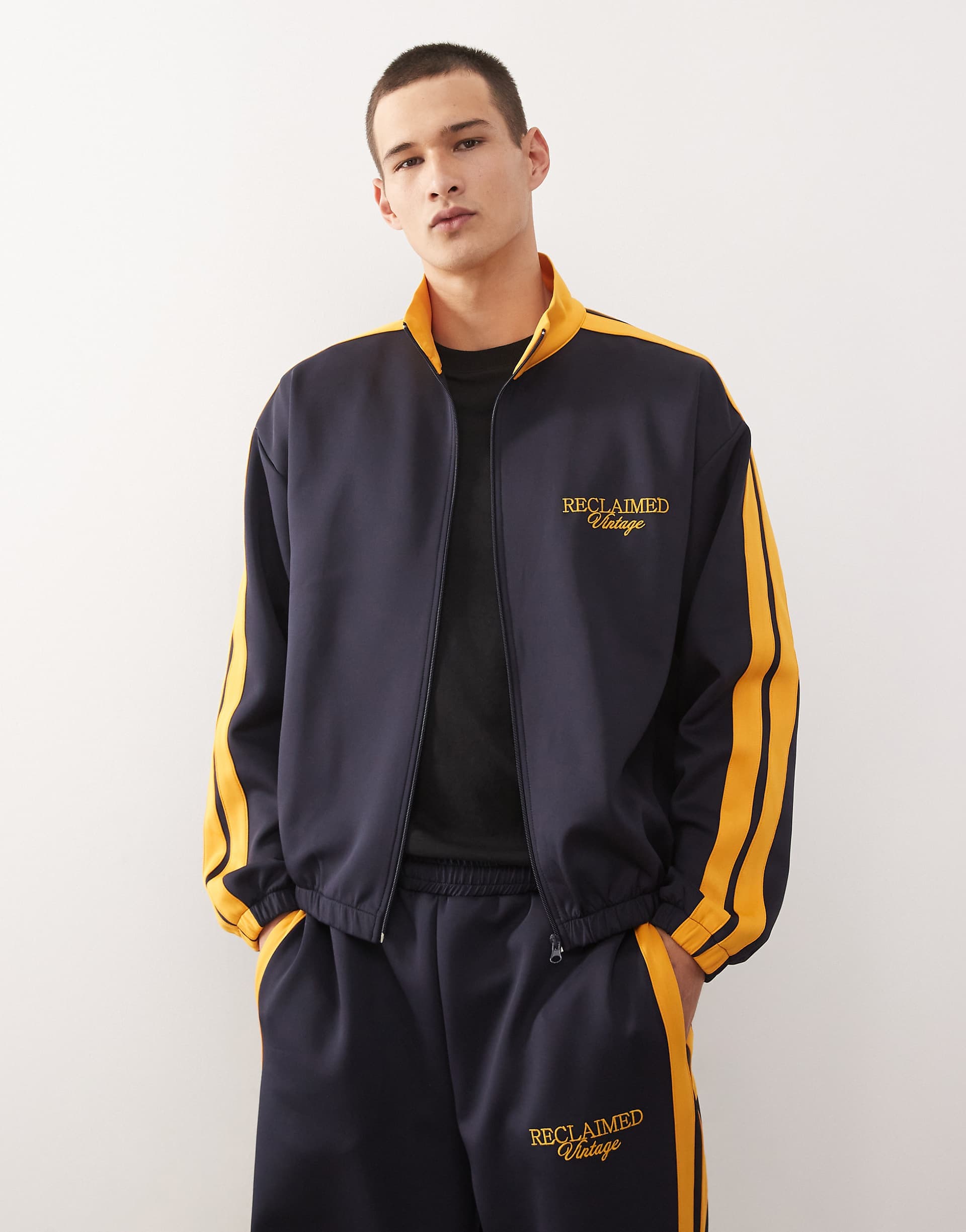 Reclaimed Vintage track jacket in navy with side stripes - part of a set