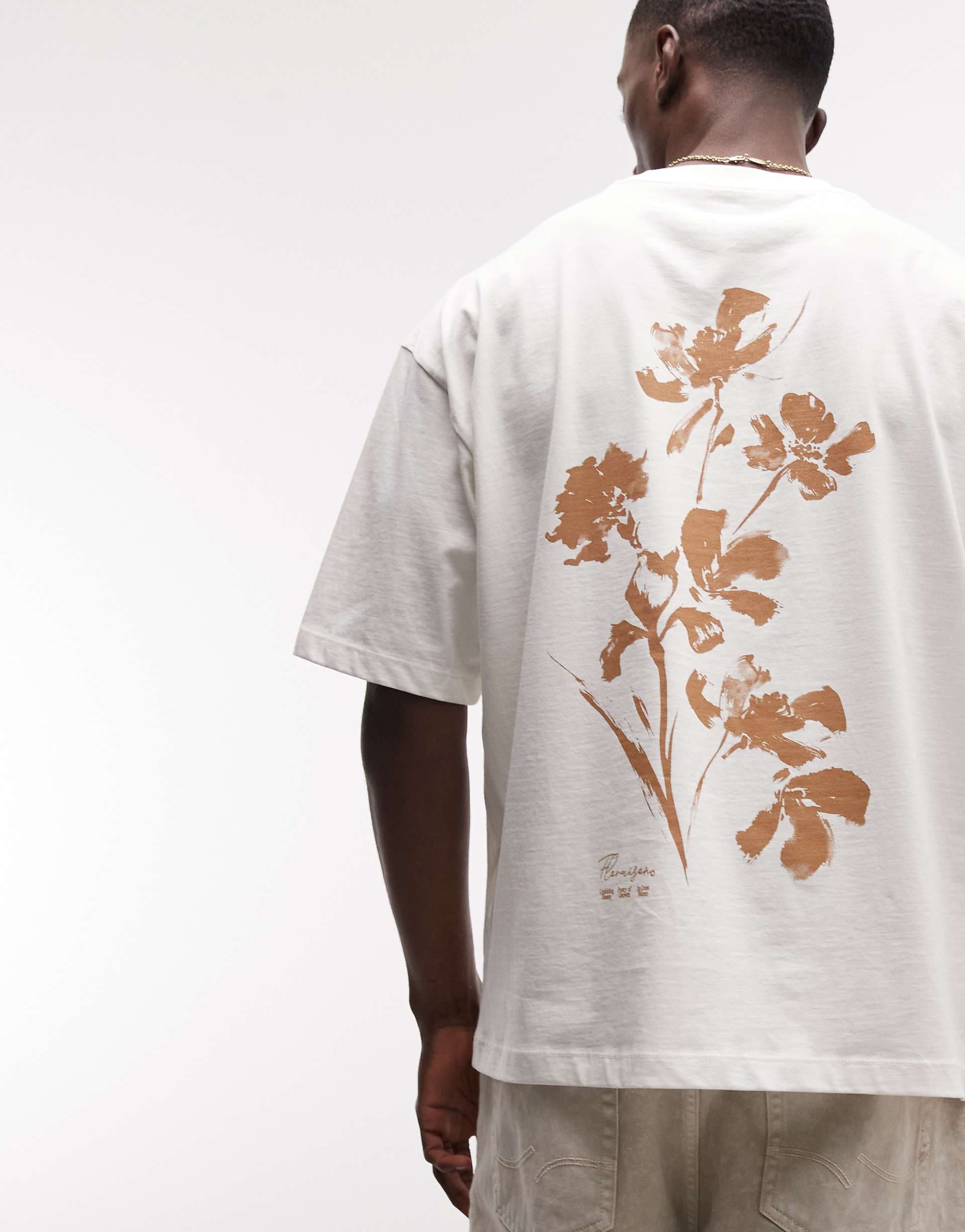ASOS DESIGN oversized T-shirt with floral graphic in cream