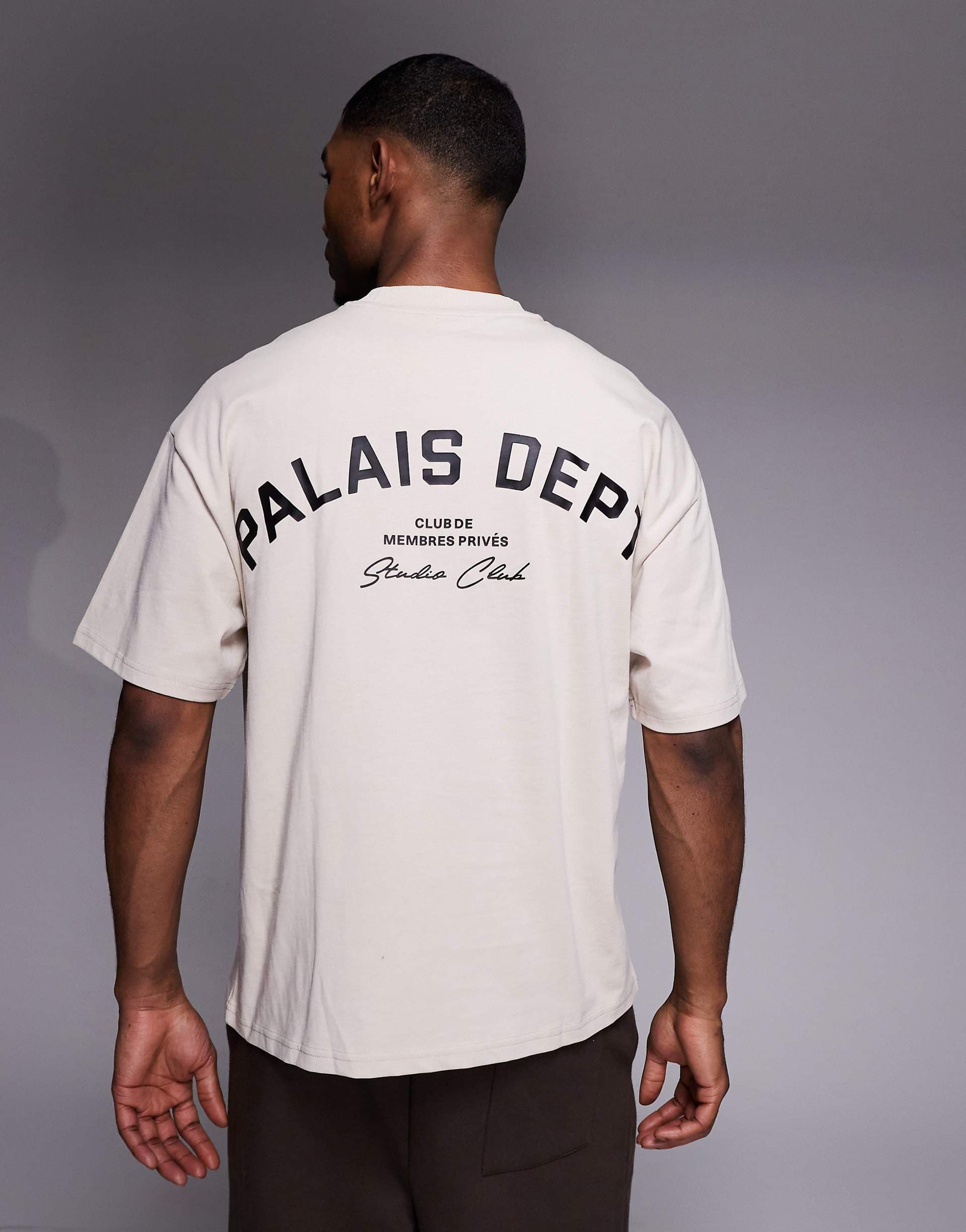 River Island oversized t-shirt with palais dept. graphics in light stone
