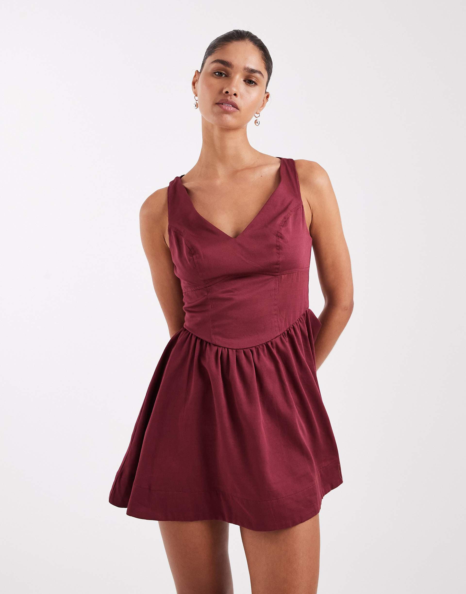 ASOS DESIGN waisted v-neck mini sundress with seaming details in washed burgundy