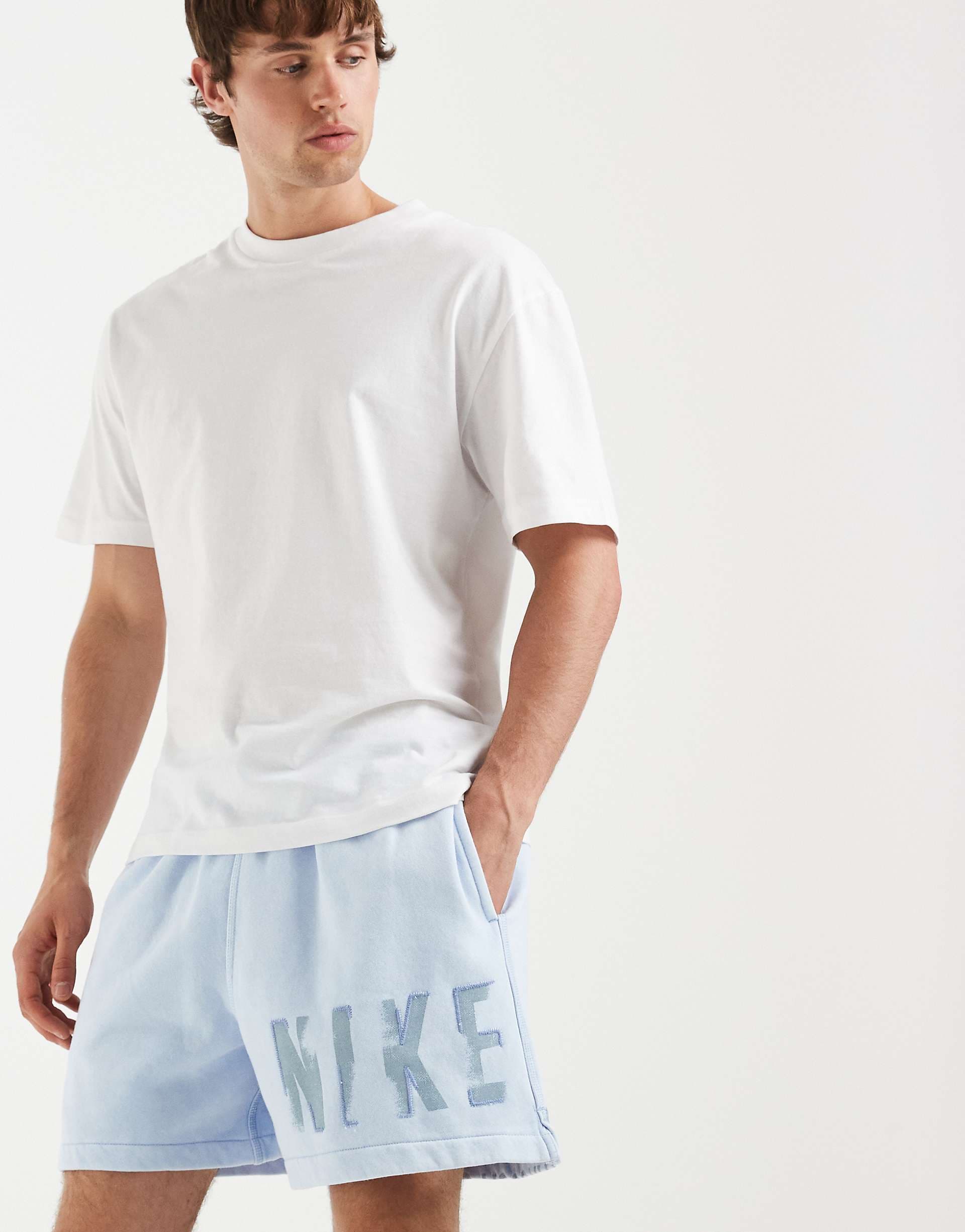 Nike Sportswear Club shorts with elastic waist in light blue