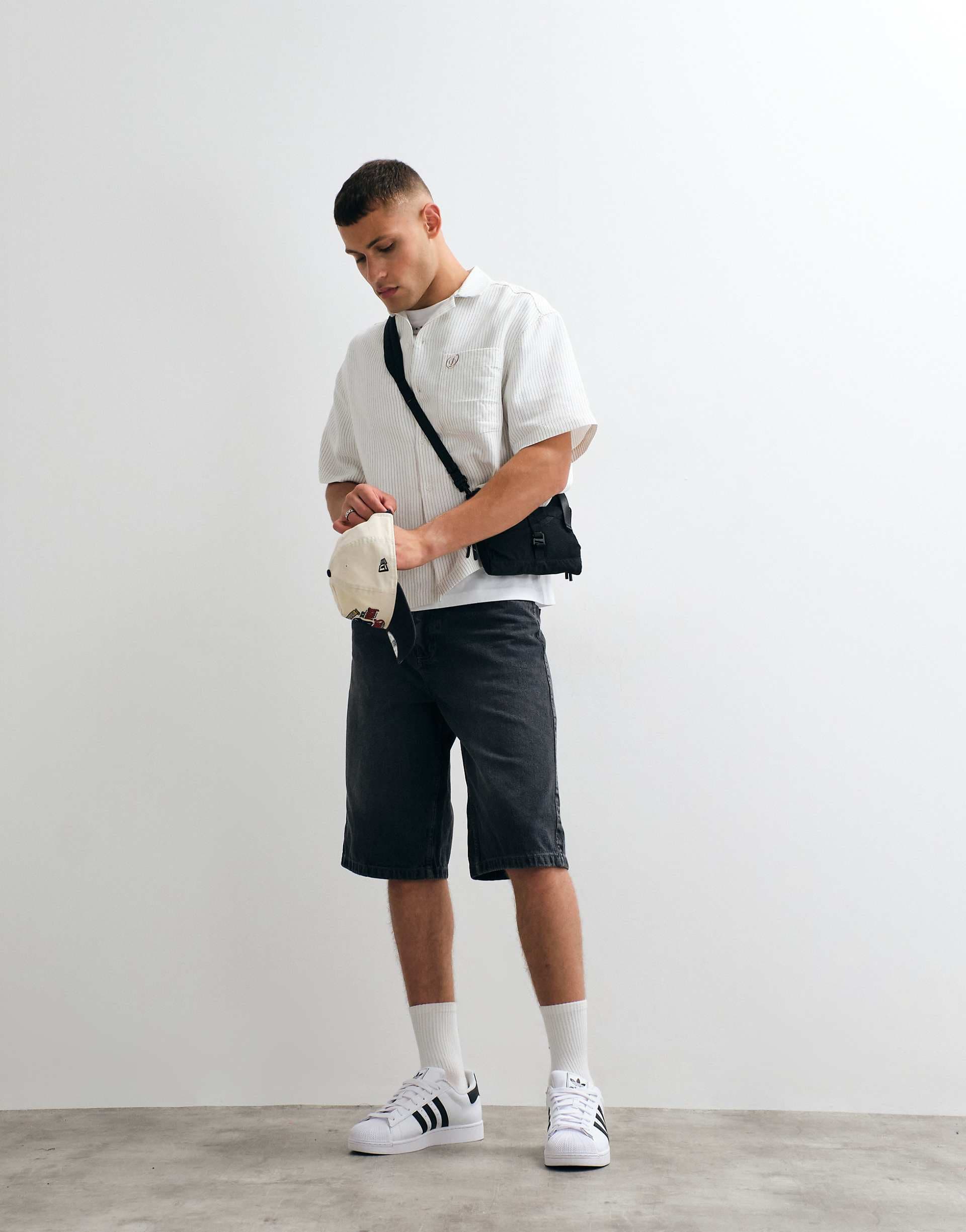 Good For Nothing baggy denim jorts in vintage black acid wash