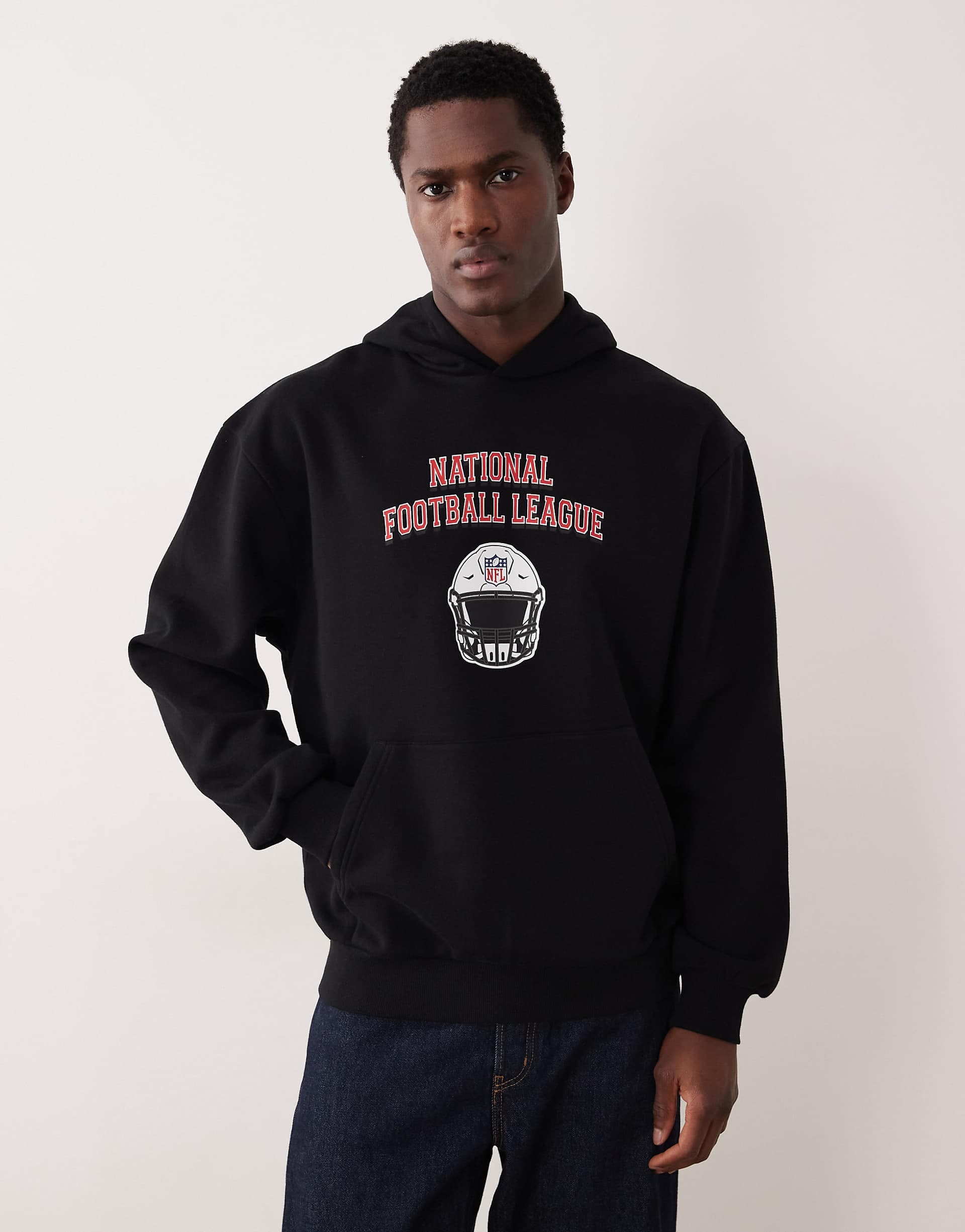 ASOS DESIGN relaxed hoodie with NFL print in black