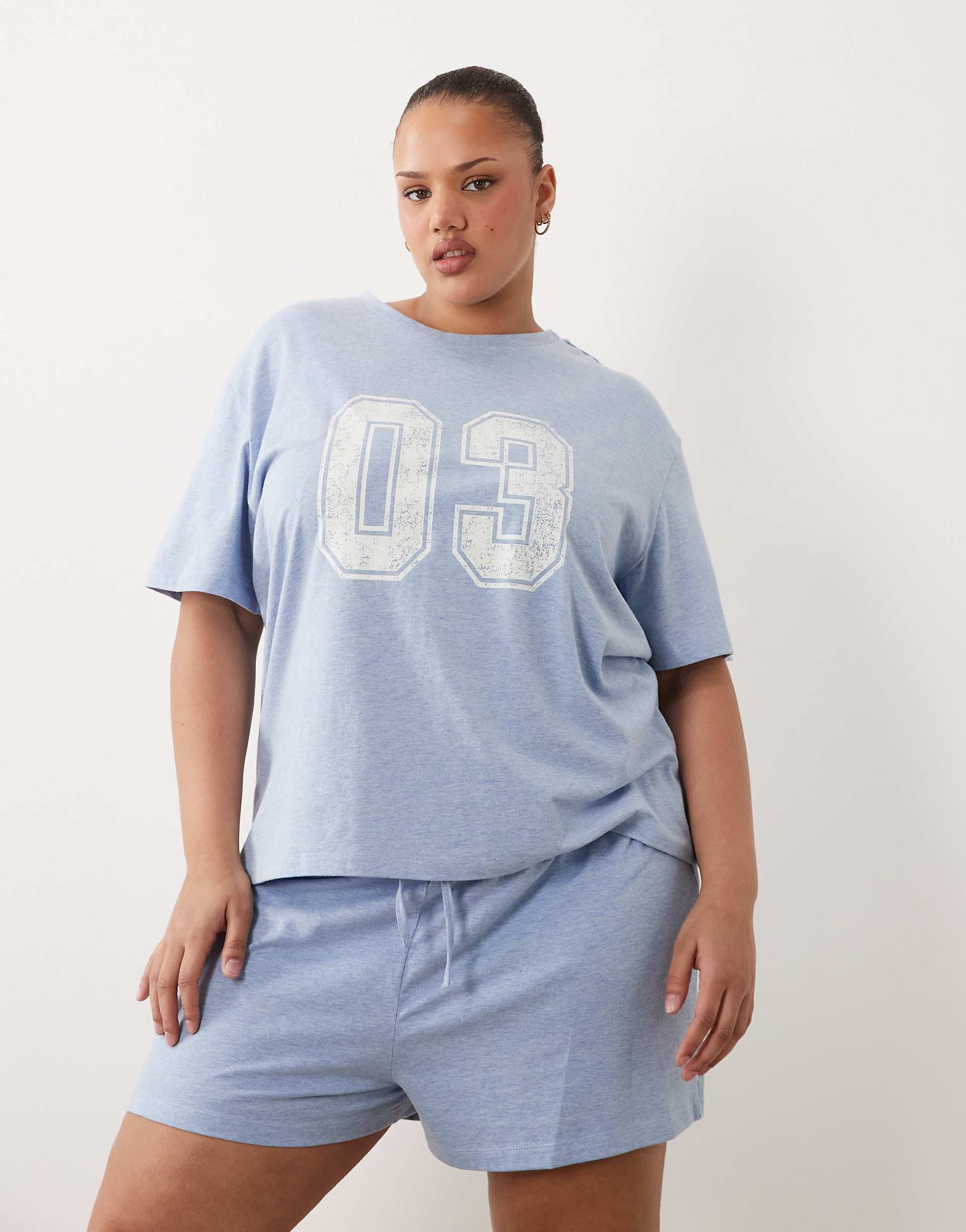 ASOS DESIGN Curve 03 graphic oversized tee and shorts set in blue