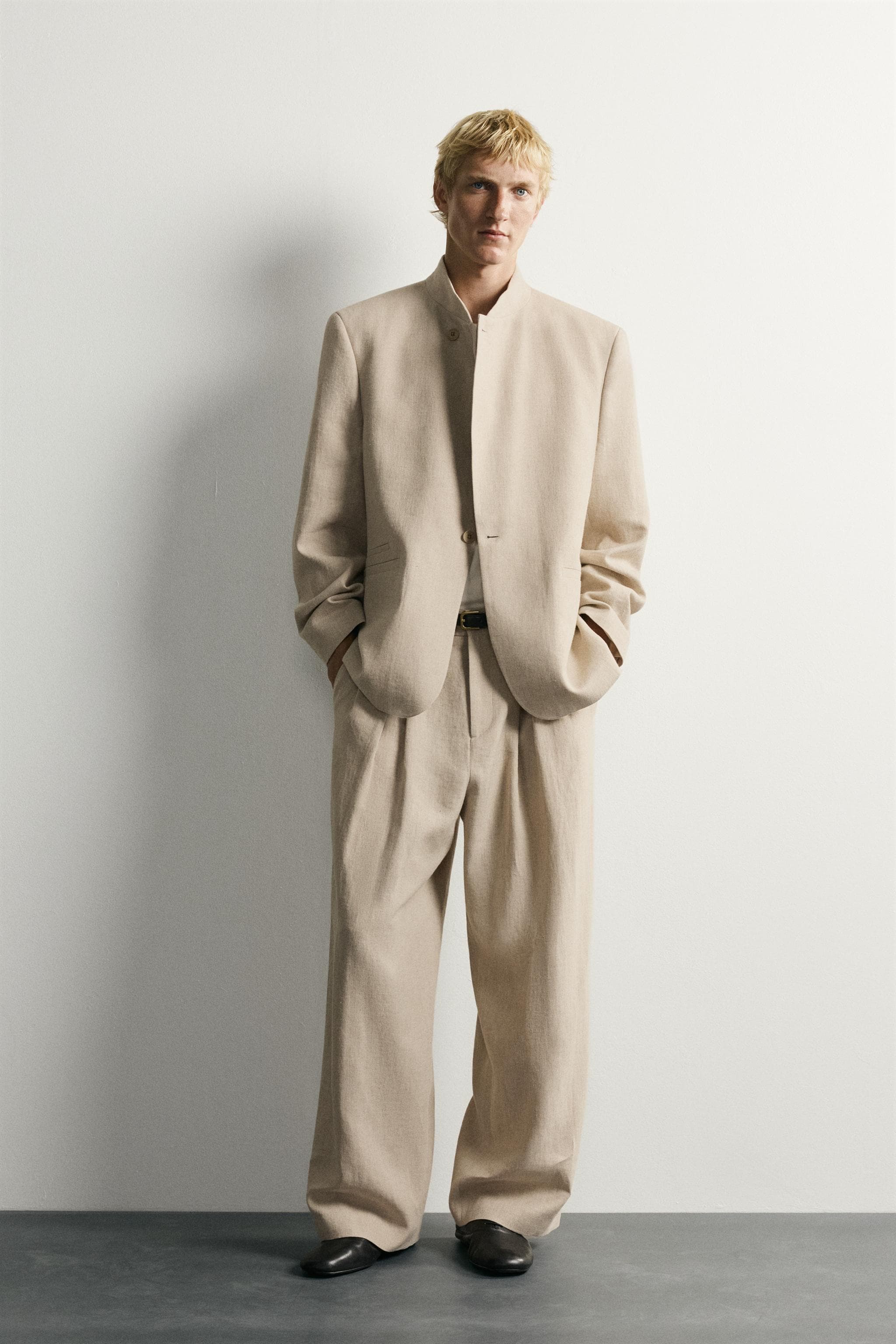 RELAXED FIT PLEATED SUIT TROUSERS