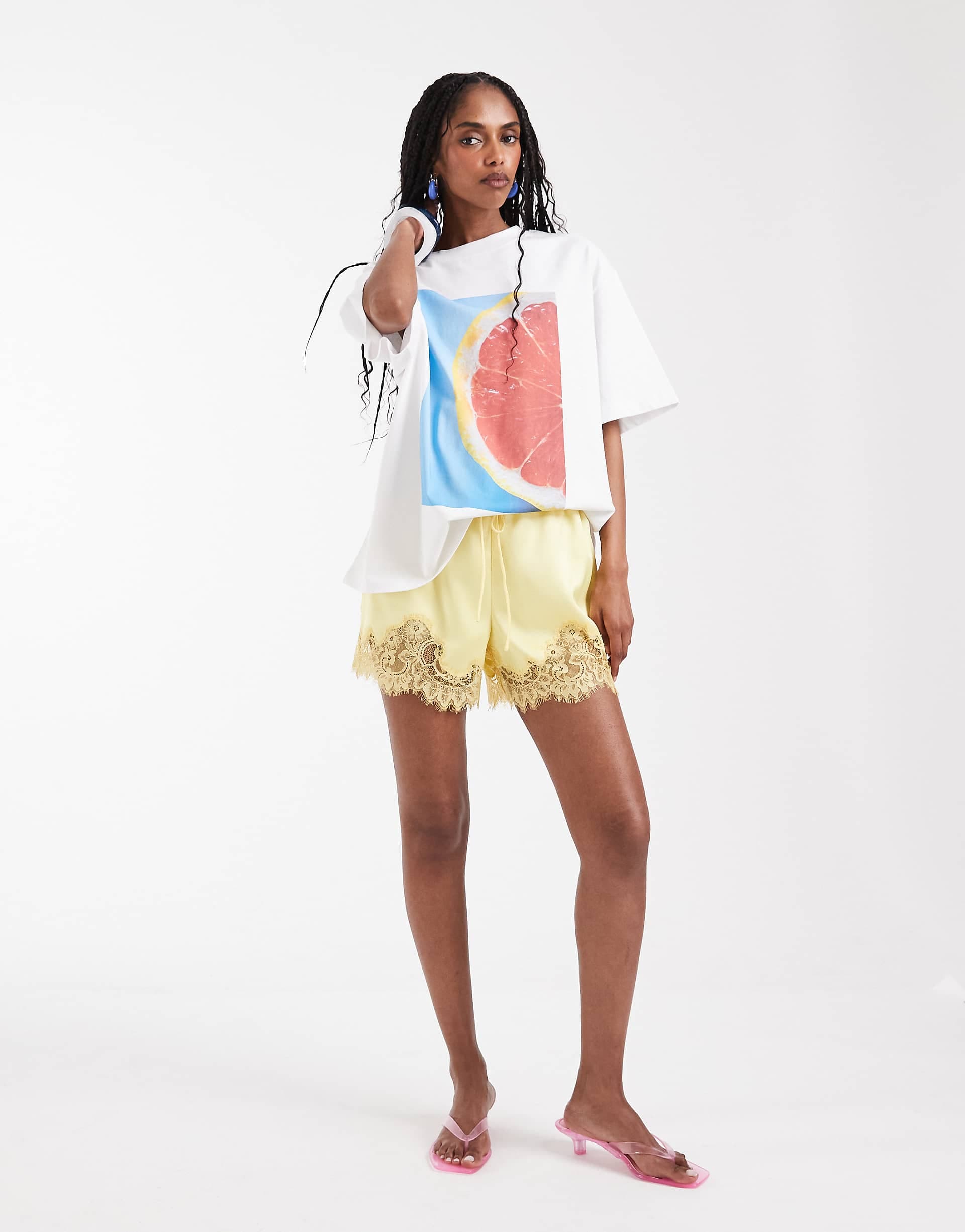 ASOS DESIGN lace trim satin drawstring waist shorts in butter yellow