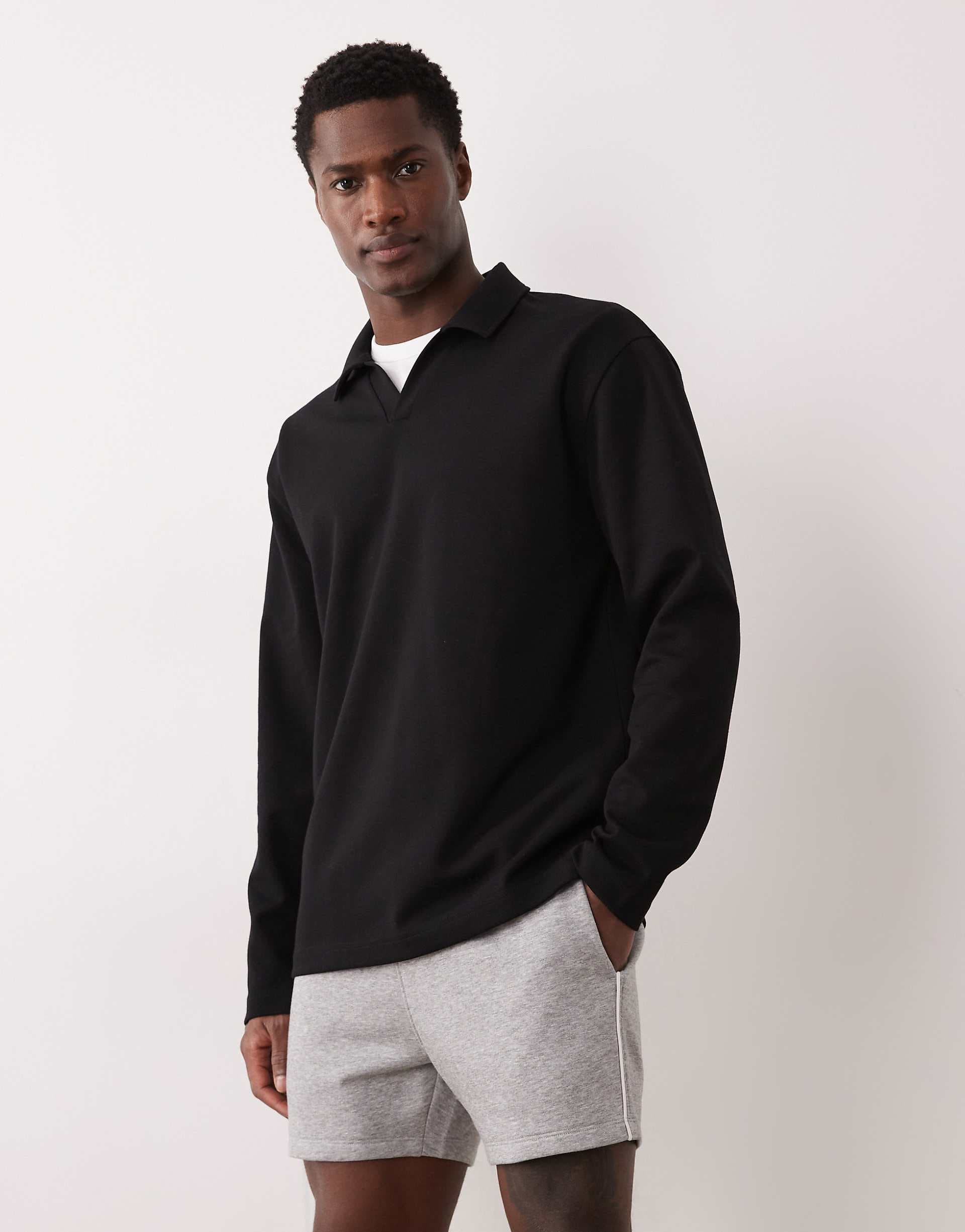 ASOS DESIGN slim fit shorter jersey shorts with contrast side piping in heather gray