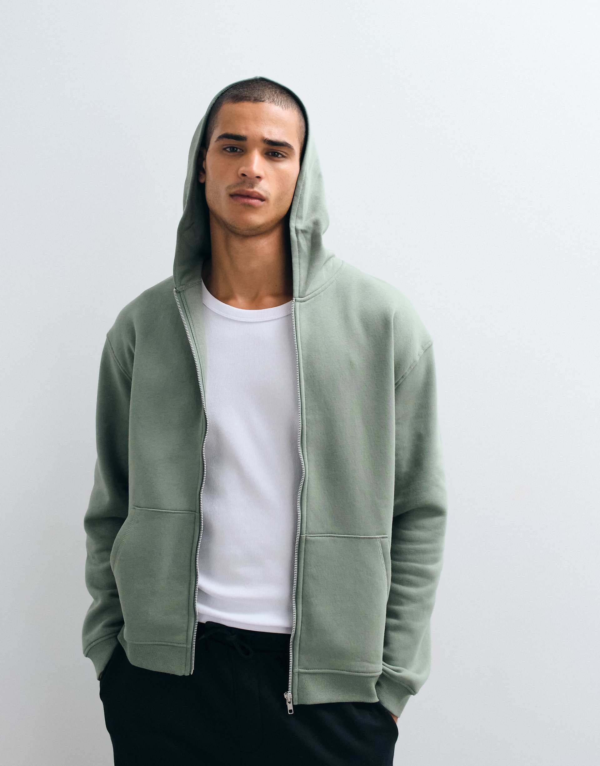 ASOS DESIGN Essentials relaxed zip up hoodie in green