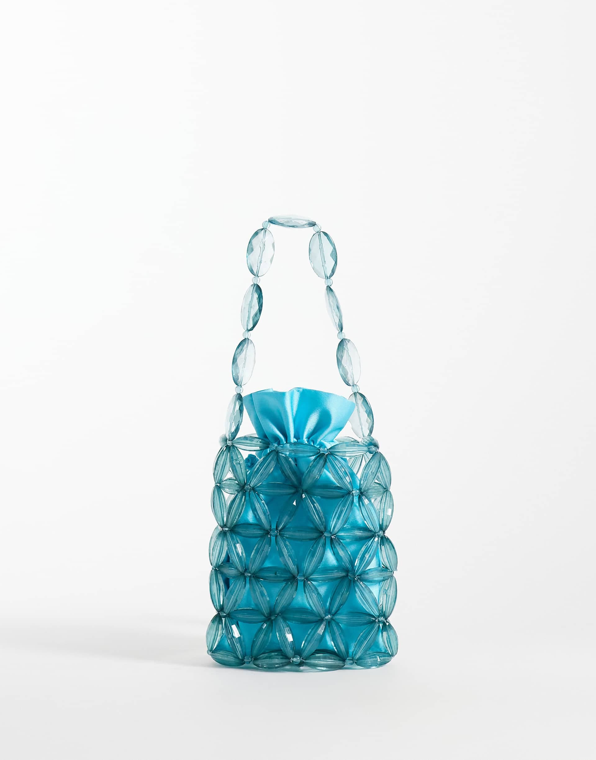 ASOS DESIGN beaded bucket clutch in turquoise