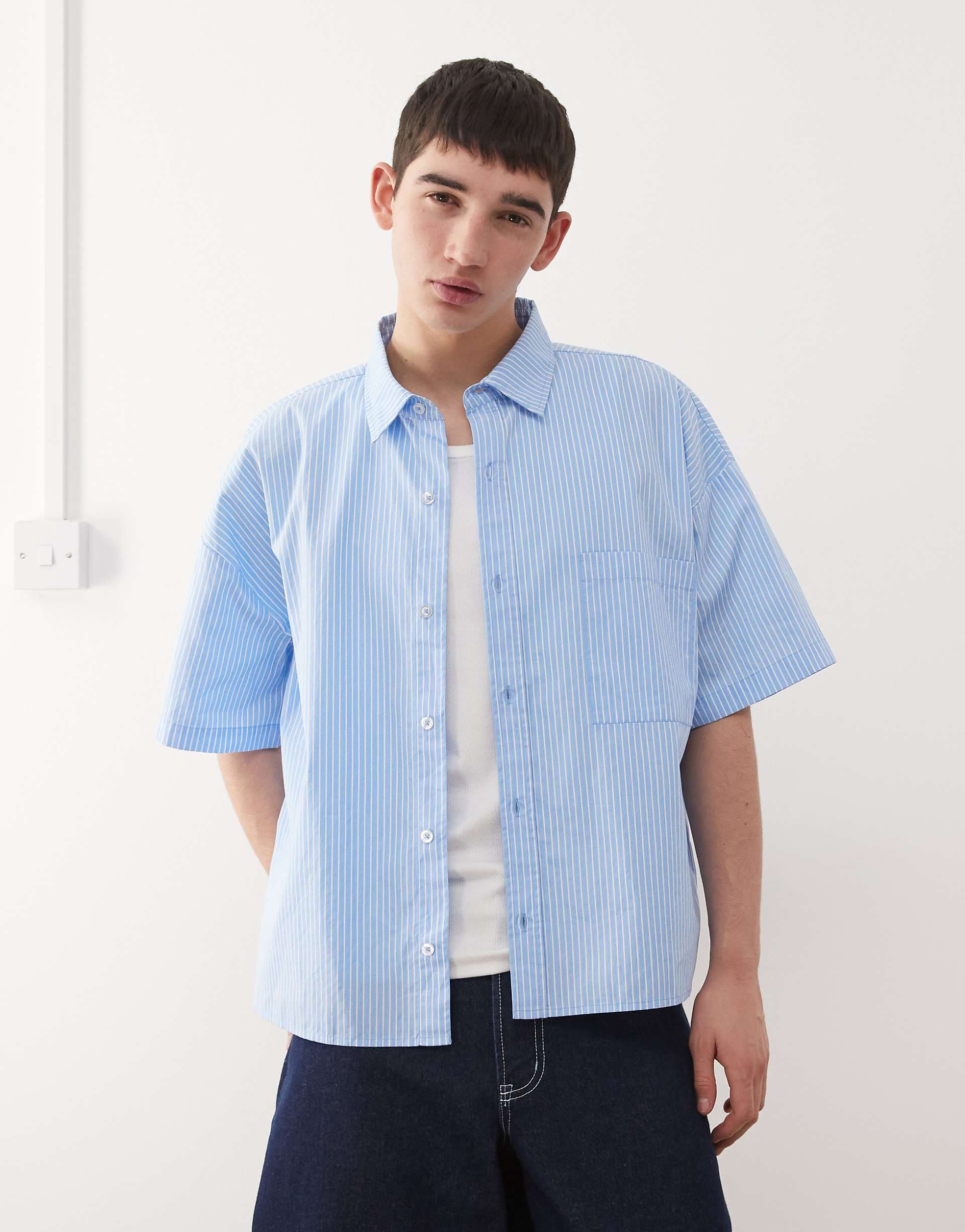 Reclaimed Vintage short sleeve cropped boxy shirt in blue and white pinstripes