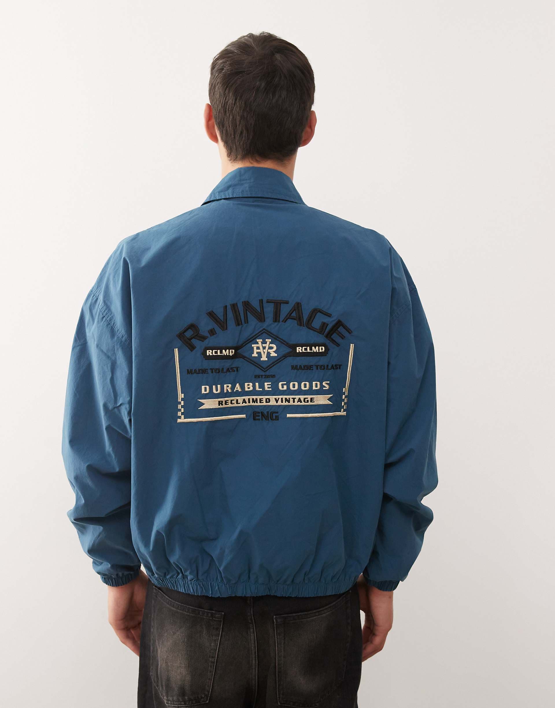 Reclaimed Vintage Harrington bomber jacket with back embroidery in ink blue
