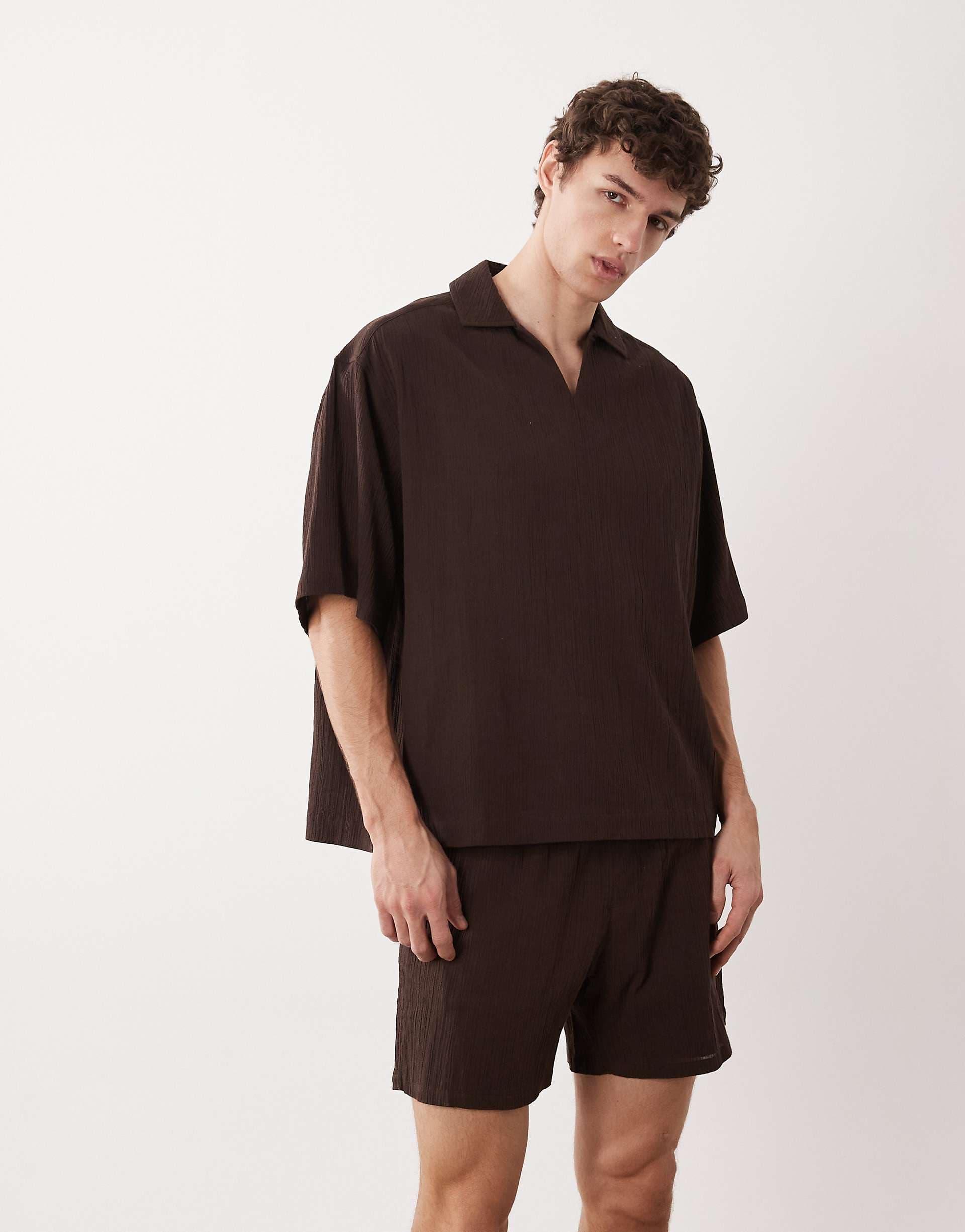 ASOS DESIGN crinkle texture shorts in mid length in brown - part of a set