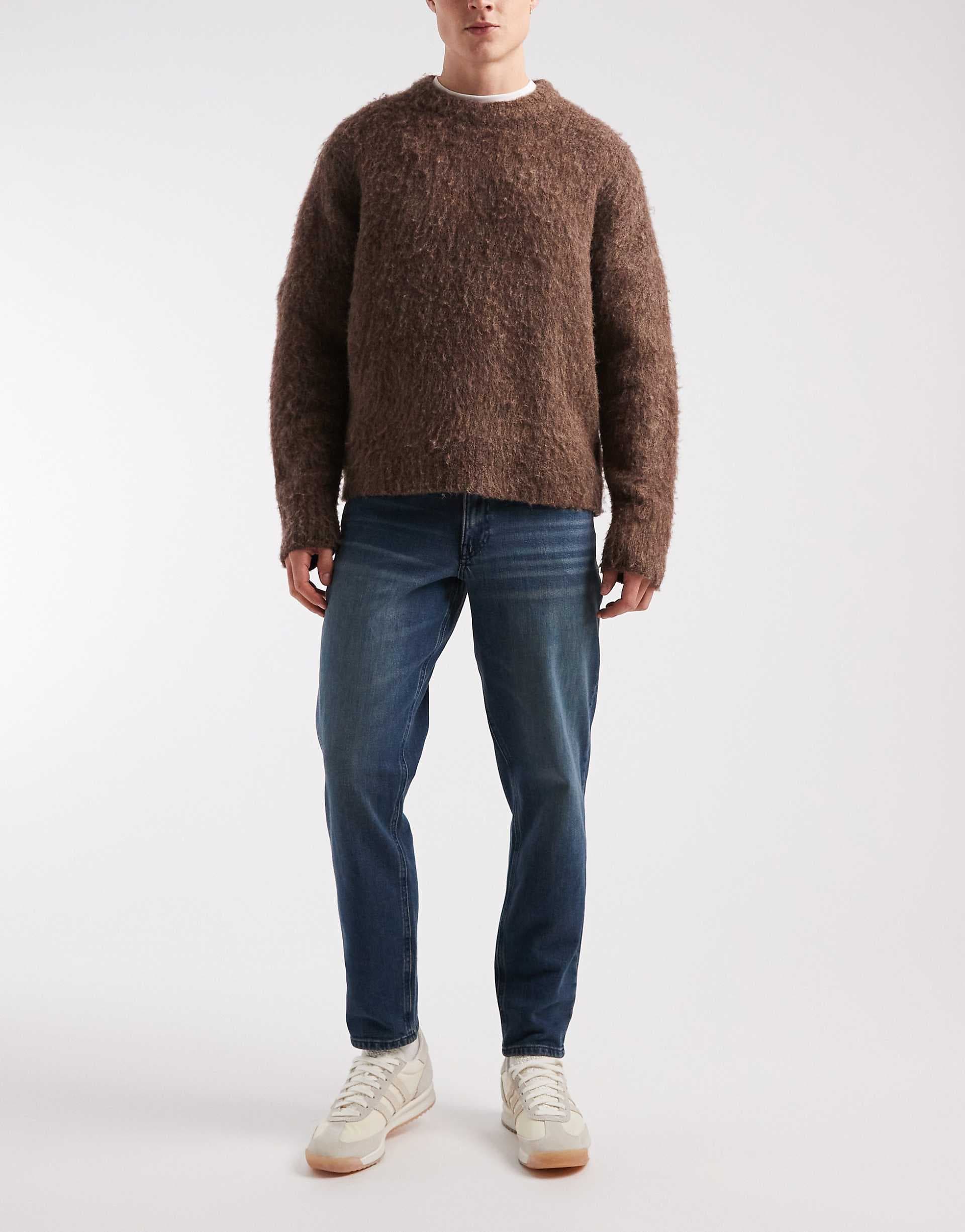 ASOS DESIGN tapered fit jeans in blue