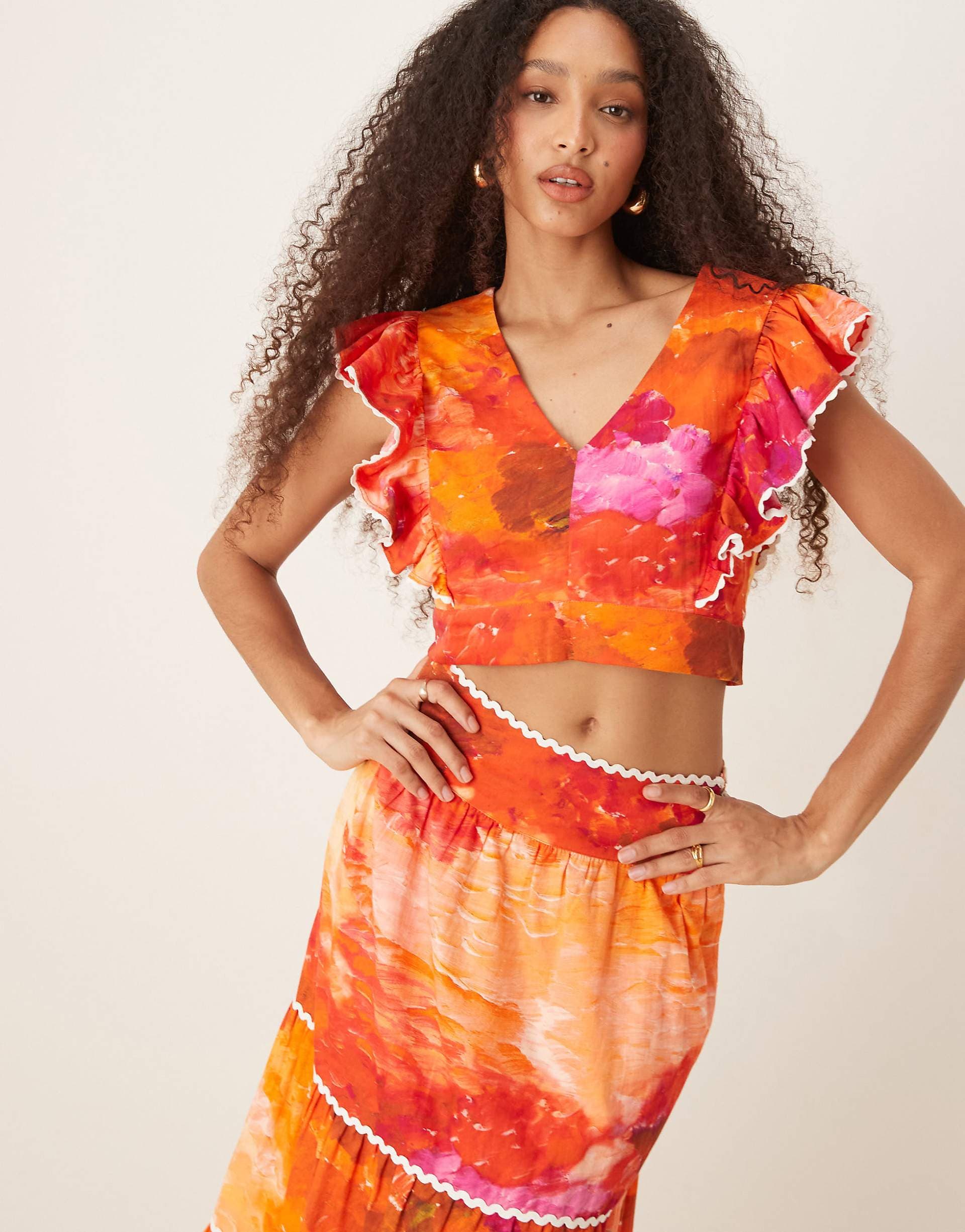 Hope & Ivy ruffle sleeve tie back cropped top in orange print - part of a set