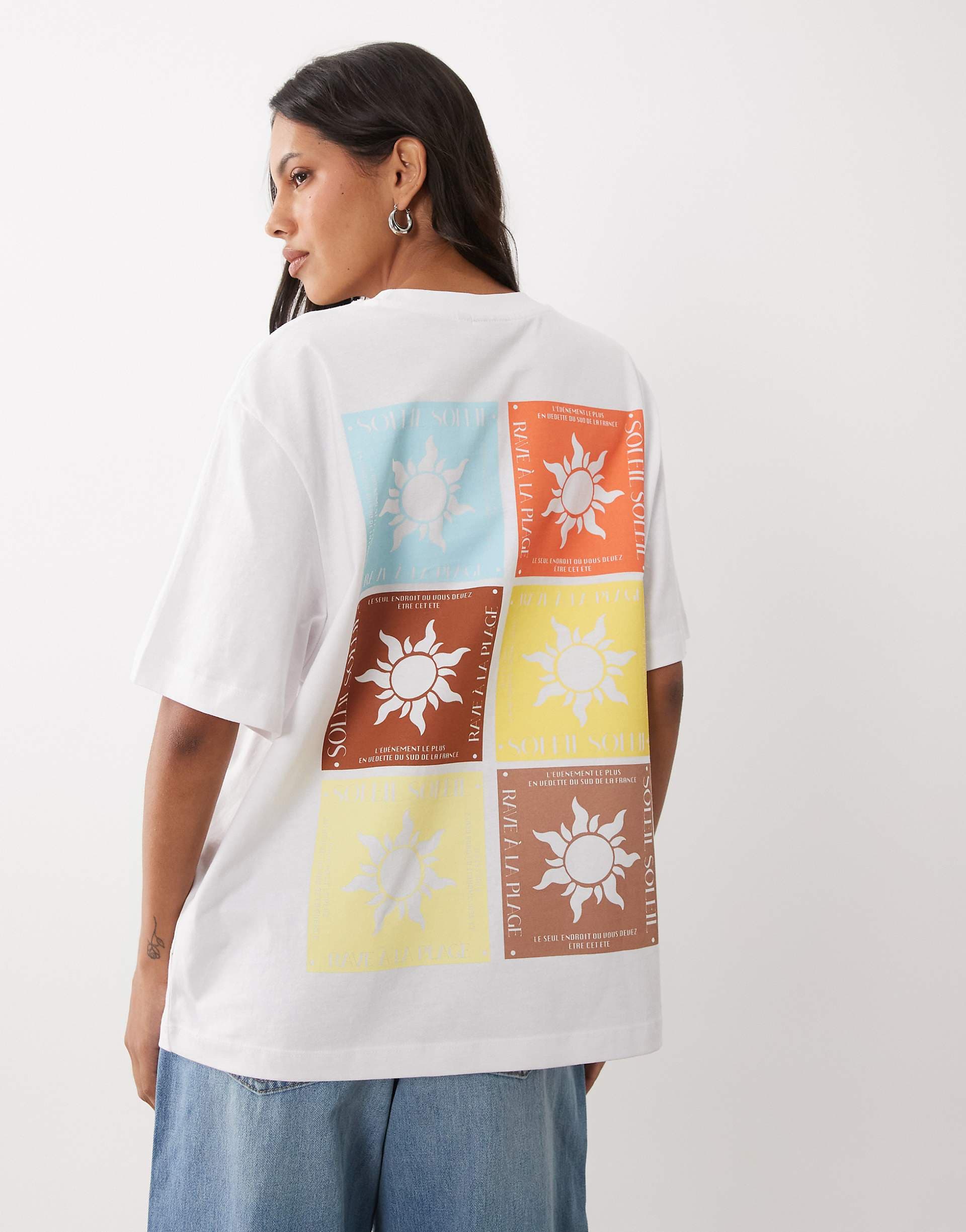 ASOS DESIGN oversized t-shirt with Soleil sun graphics in white