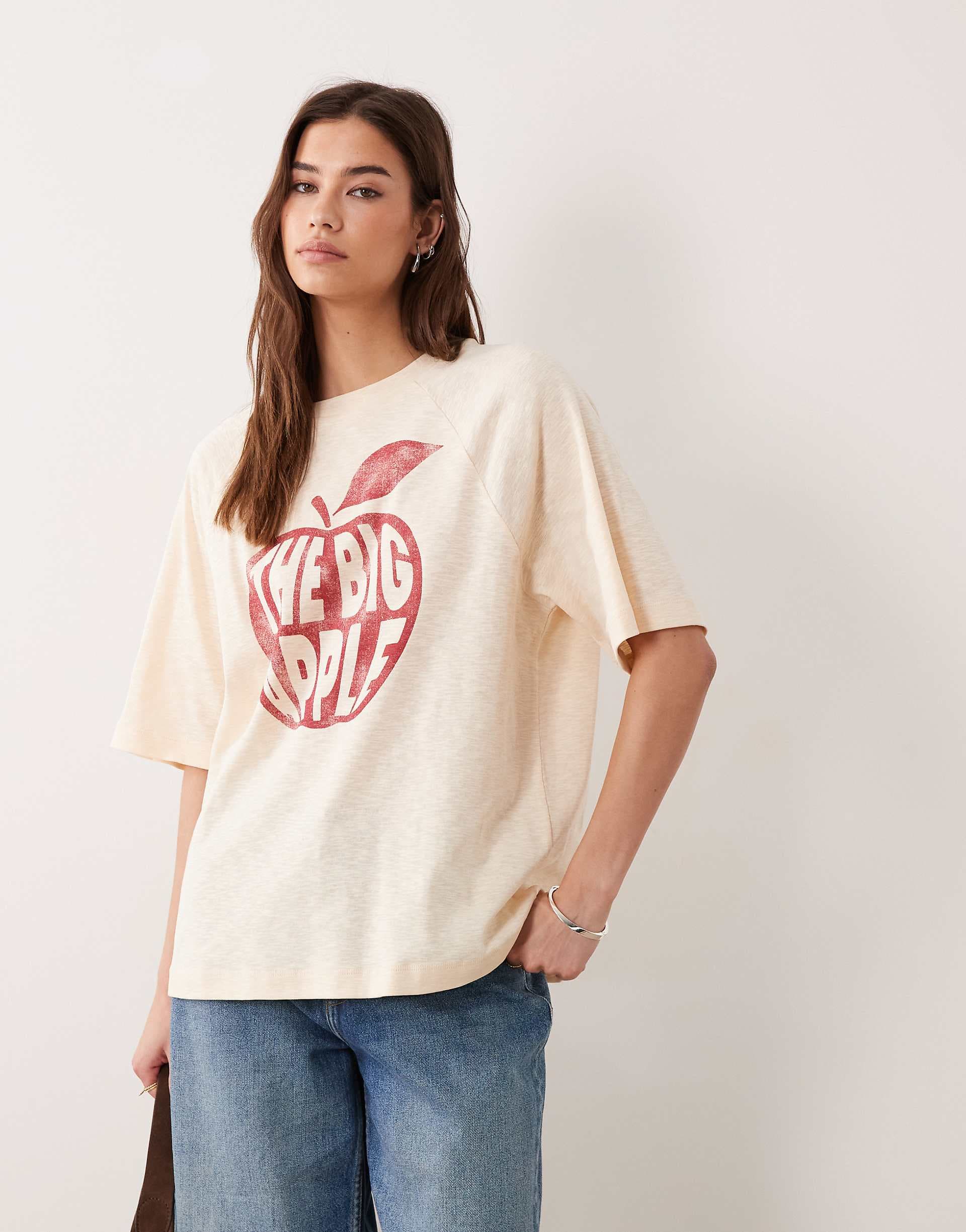 ASOS DESIGN oversized t-shirt in slubby texture with the big apple graphic in cream