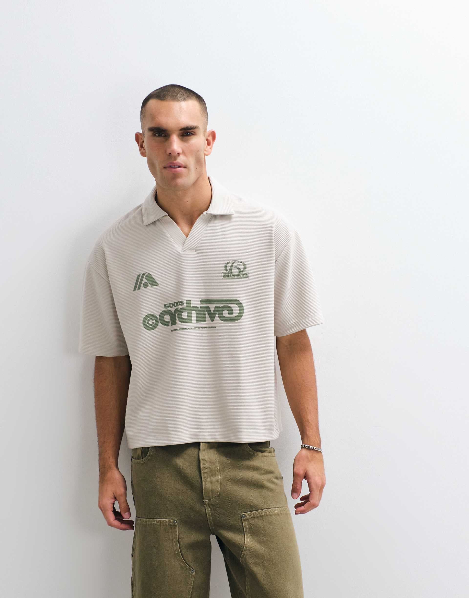 ASOS DESIGN super heavyweight boxy oversized polo with soccer graphic in off white ribbed fabric