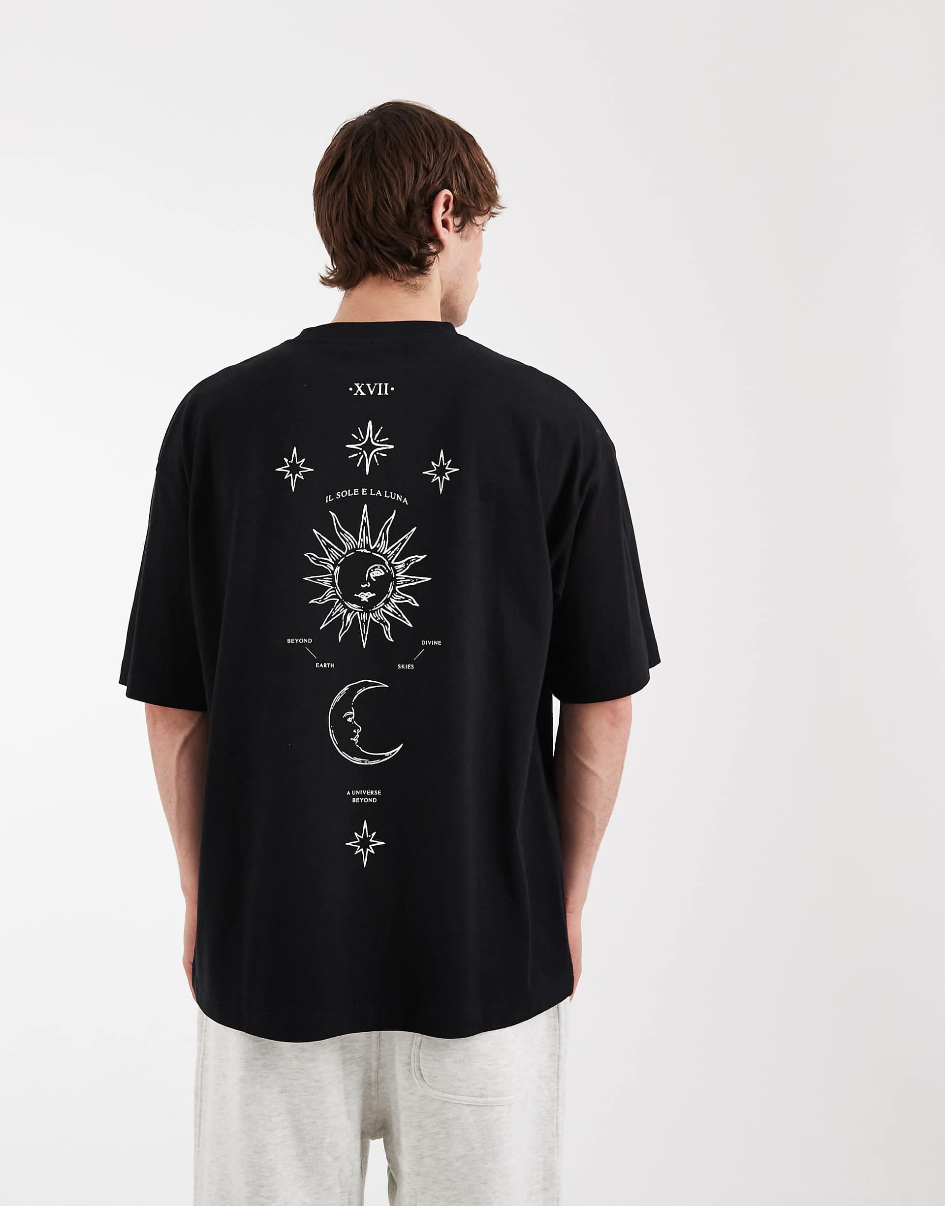 ASOS DESIGN oversized t-shirt with celestial graphic in black