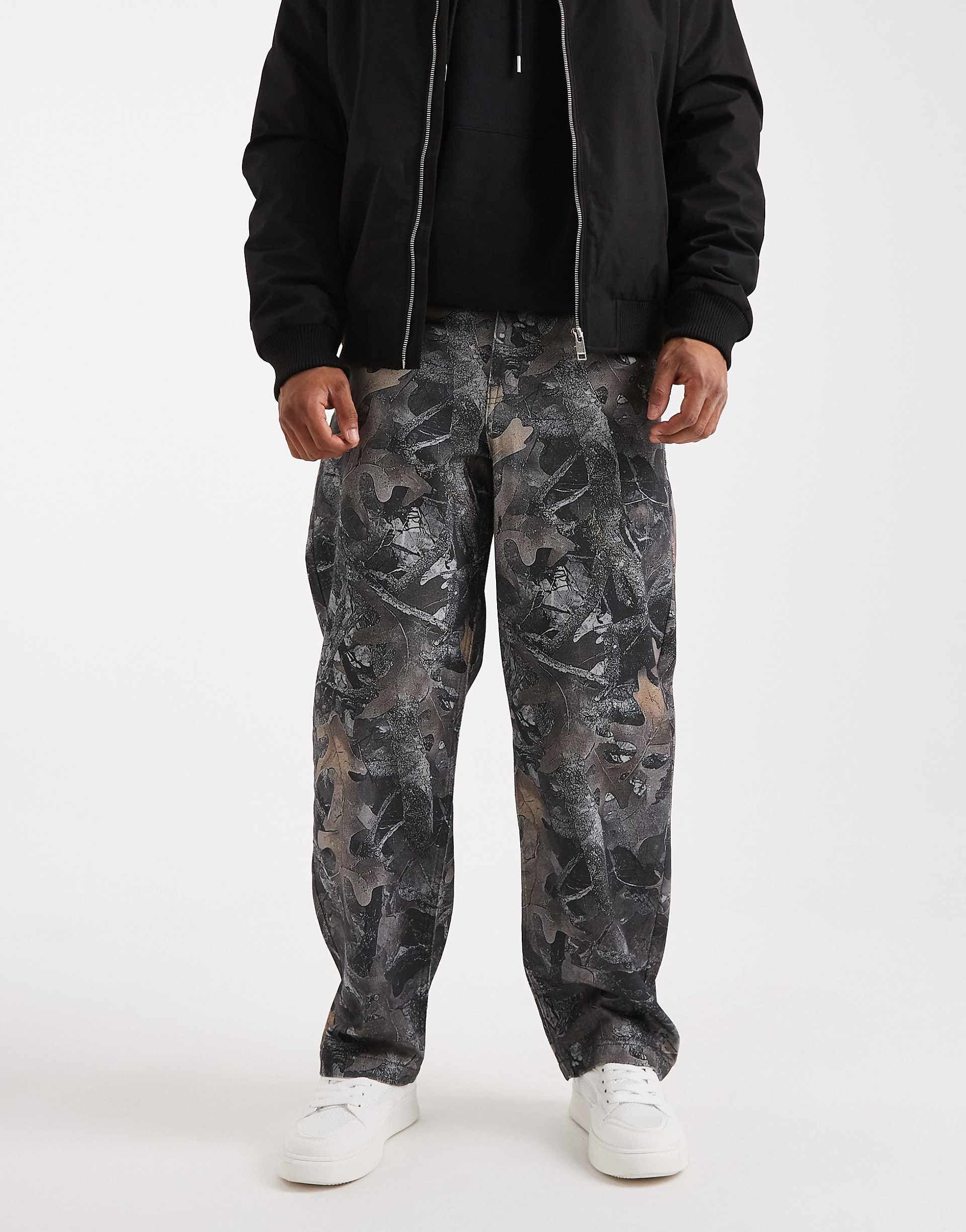 ASOS DESIGN loose pants in camo